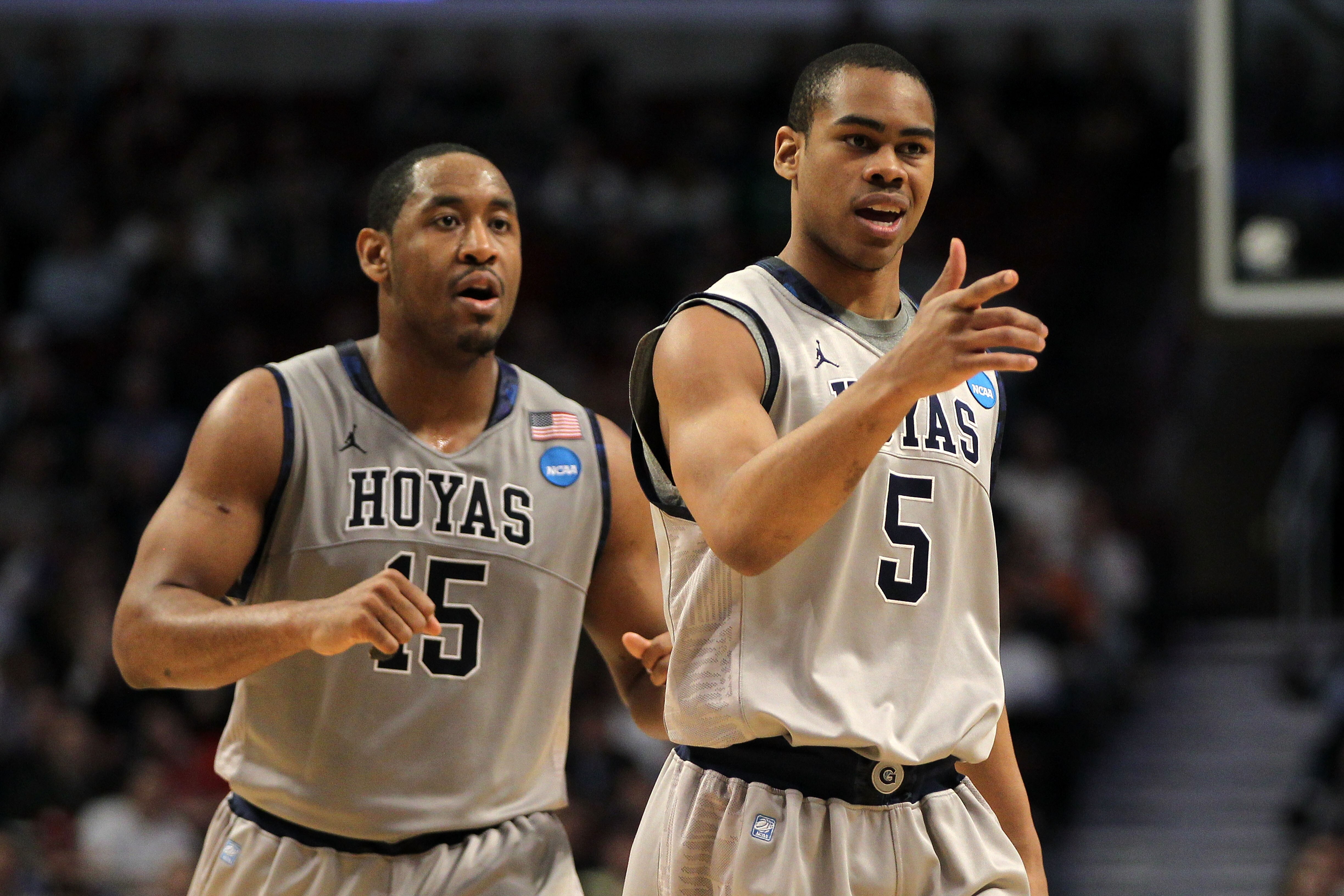 CHICAGO, IL - MARCH 18: Austin Freeman #15 and Markel Starks #5 of the Georgetown Hoyas look on in the second half against the Virginia Commonwealth Rams during the second round of the 2011 NCAA men's basketball tournament at the United Center on March 18
