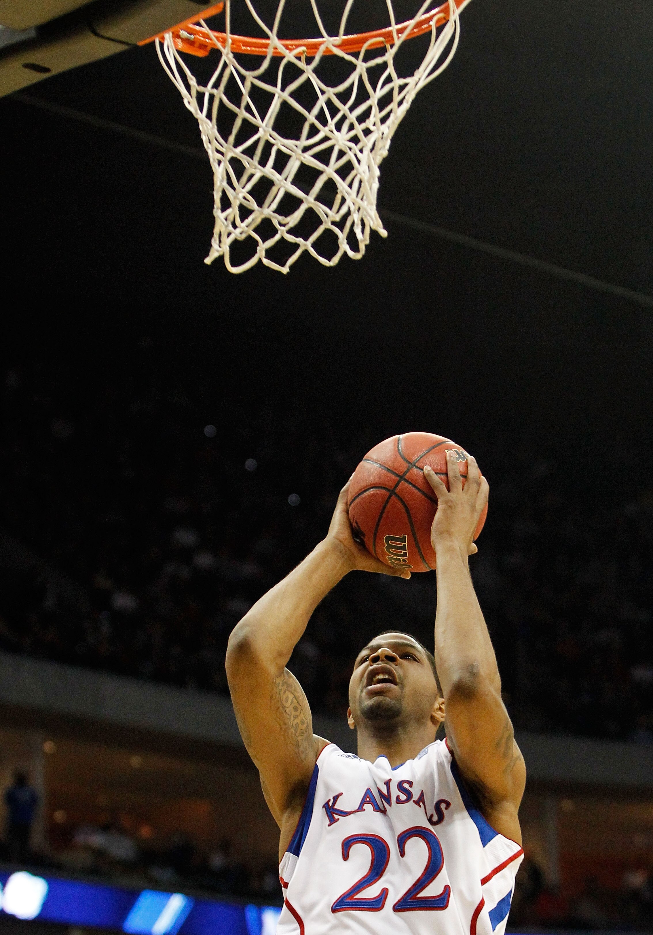 TULSA, OK - MARCH 18:  Marcus Morris #22 of the Kansas Jayhawks goes up for a shot against the Boston University Terriers during the second round of the 2011 NCAA men's basketball tournament at BOK Center on March 18, 2011 in Tulsa, Oklahoma.  (Photo by T