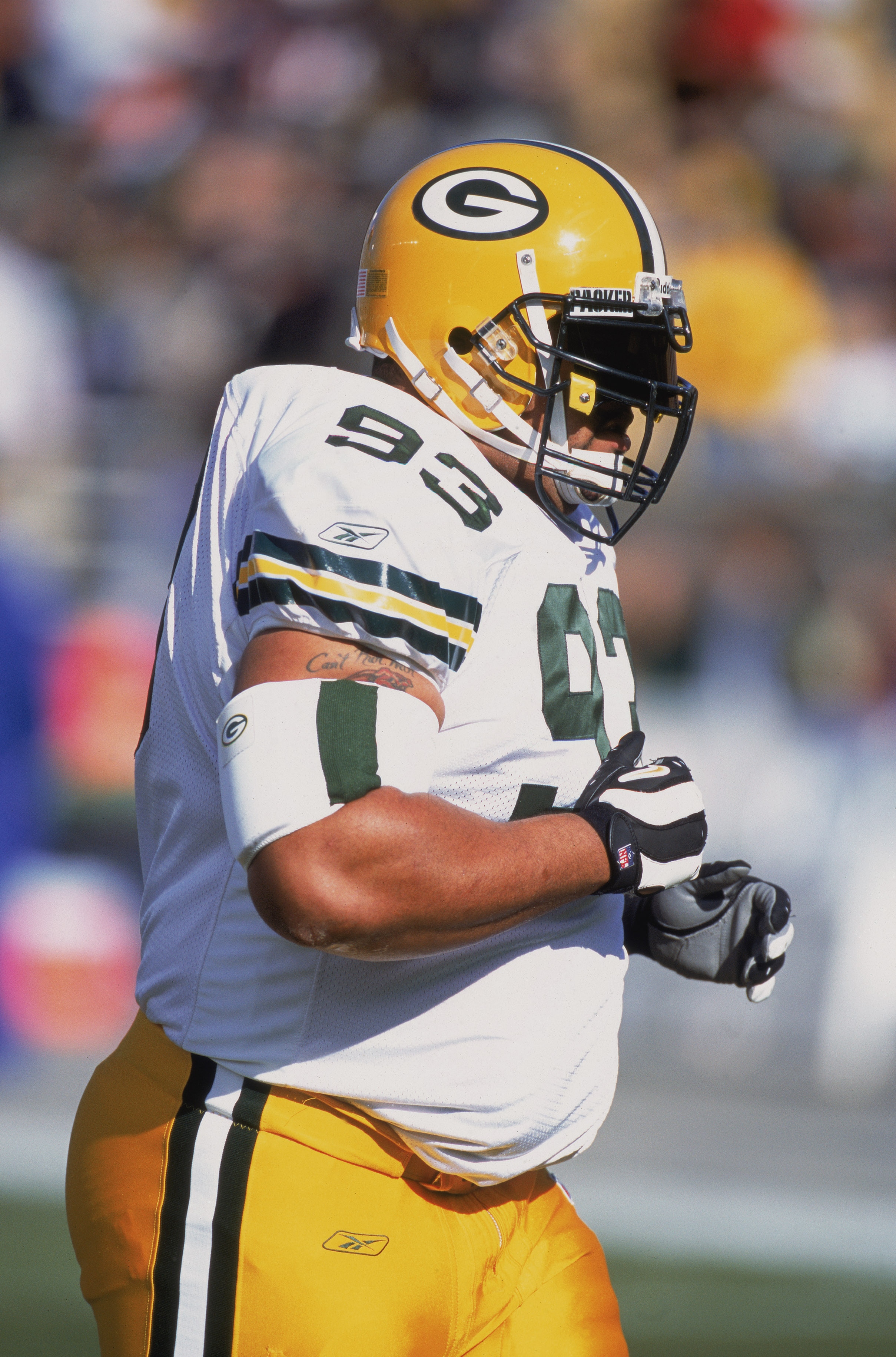 11 Nov 2001:  Tackle Gilbert Brown #93 of the Green Bay Packers heading to the huddle during the game against the Chicago Bears at Soldiers Field in Chicago, Illinois. The Packers defeated the Bears 20-12.Mandatory Credit: Jonathan Daniel /Allsport