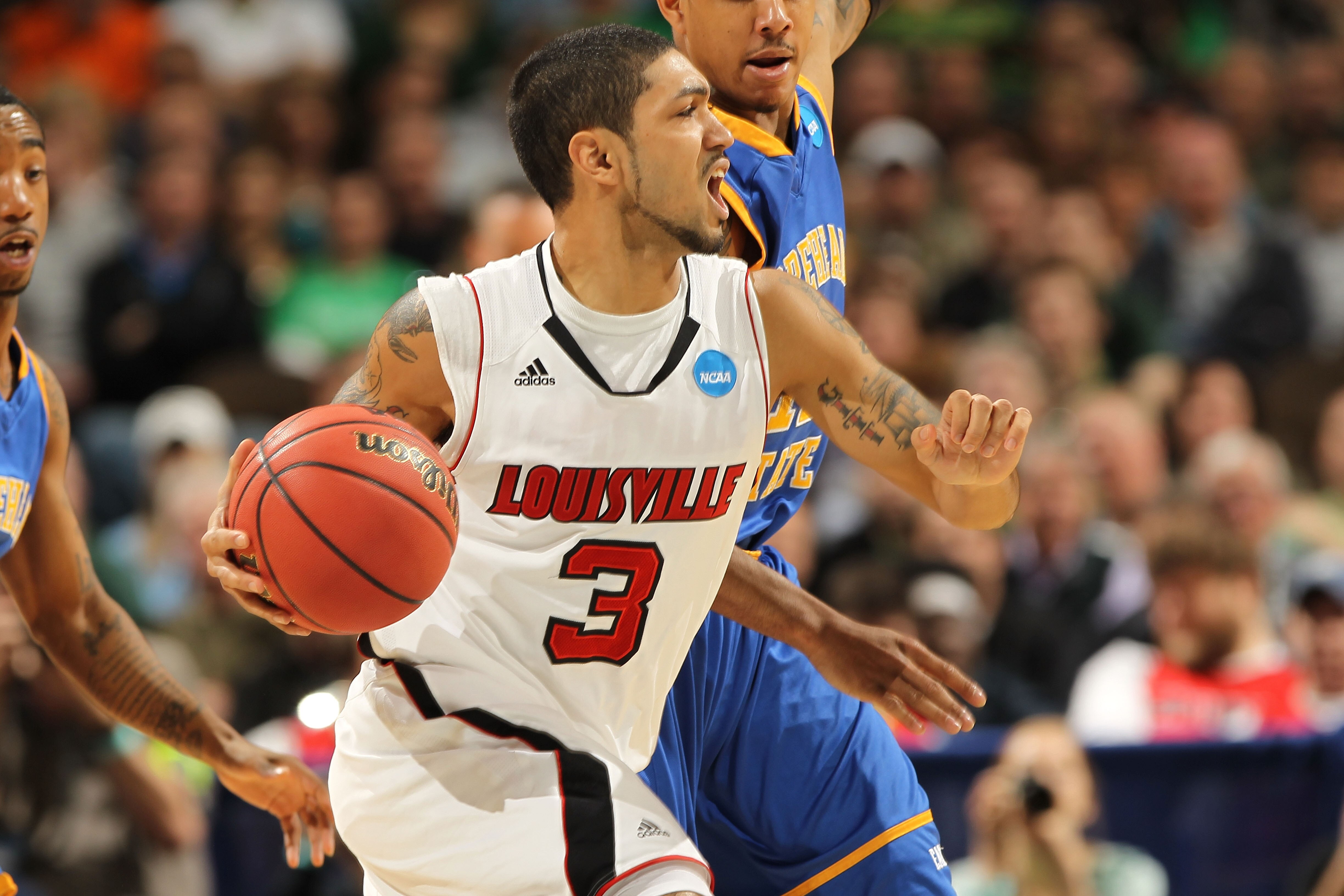 DENVER, CO - MARCH 17:  Peyton Siva #3 of the Louisville Cardinals handles the ball against the Morehead State Eagles during the second round of the 2011 NCAA men's basketball tournament at Pepsi Center on March 17, 2011 in Denver, Colorado.  (Photo by Do