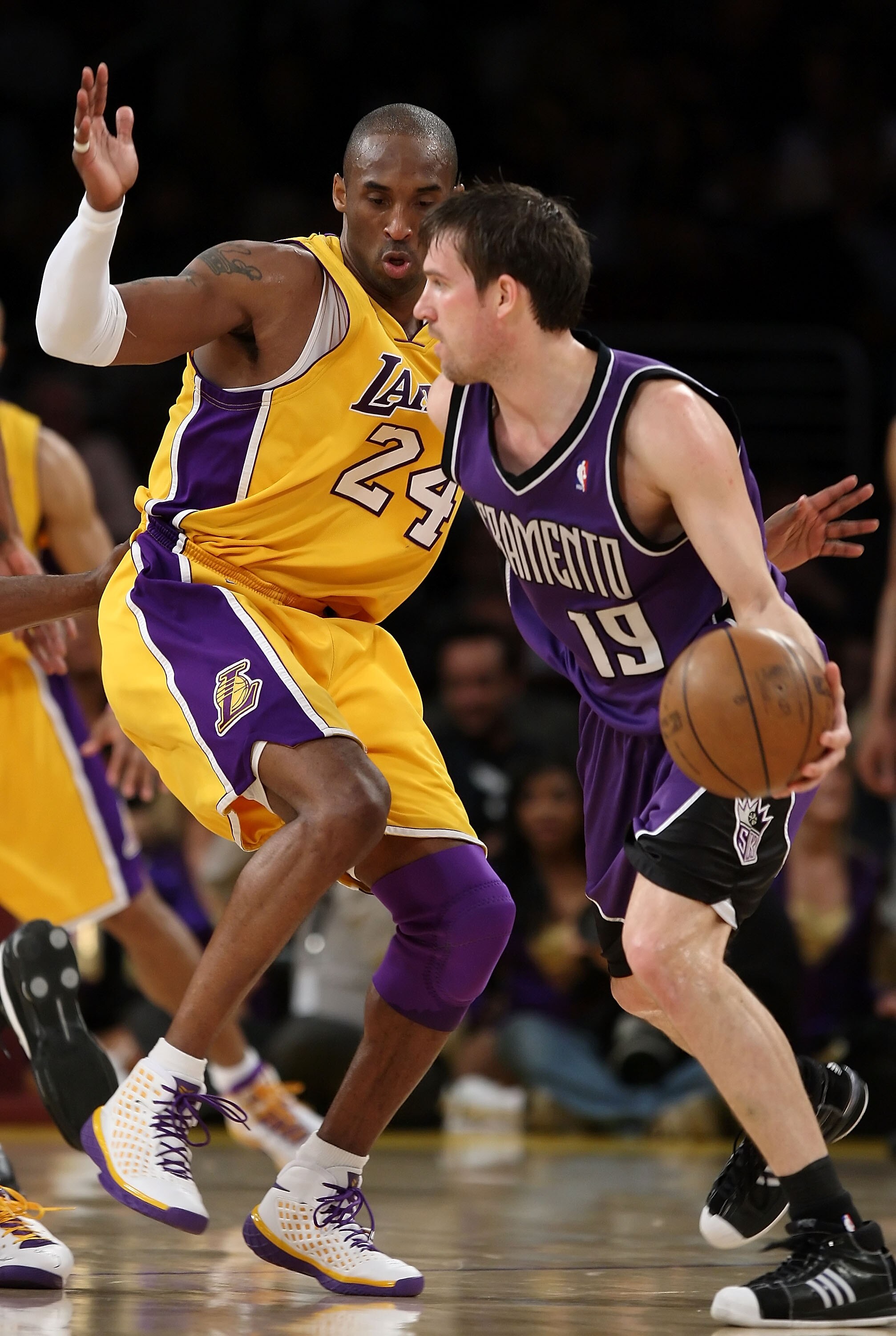 LOS ANGELES, CA - APRIL 15:   Kobe Bryant #24 of the Los Angeles Lakers puts the pressure on Beno Udrih #19 of the Sacramento Kings at Staples Center on April 15, 2008 in Los Angeles, California.  NOTE TO USER: User expressly acknowledges and agrees that,
