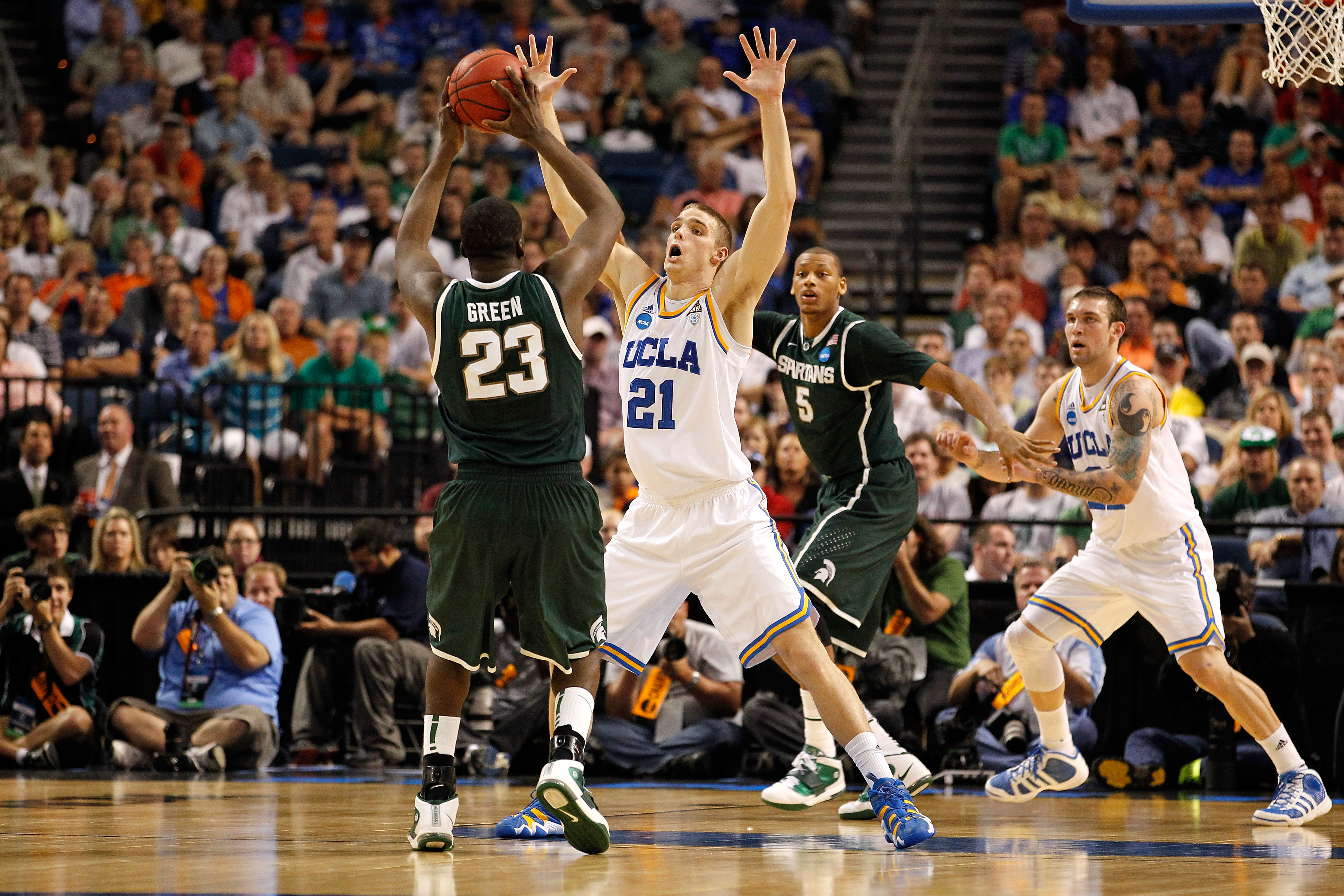 TAMPA, FL - MARCH 17:  Brendan Lane #21 of the UCLA Bruins defends against Draymond Green #23 of the Michigan State Spartans during the second round of the 2011 NCAA men's basketball tournament at St. Pete Times Forum on March 17, 2011 in Tampa, Florida.