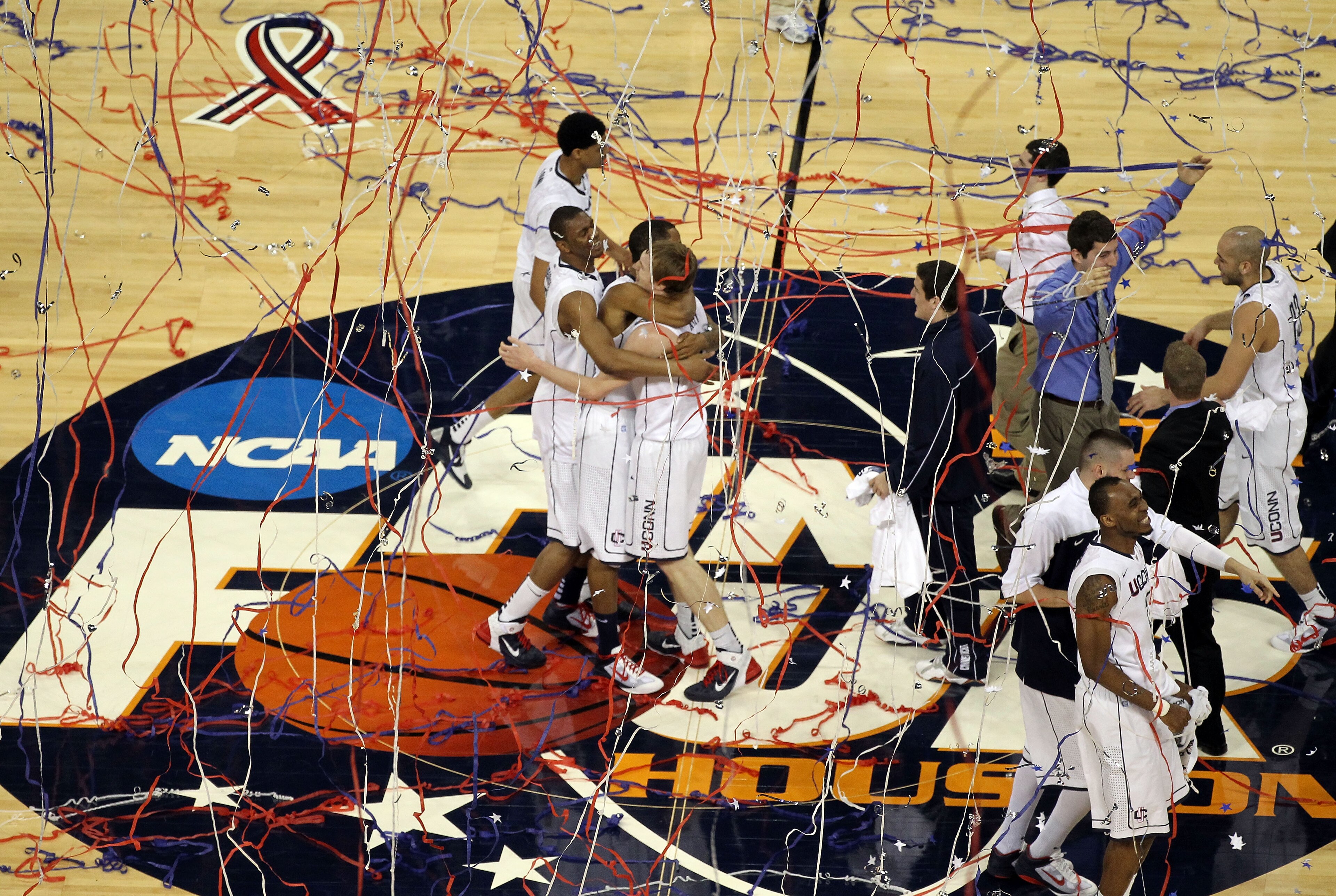 HOUSTON, TX - APRIL 04: The Connecticut Huskies react after defeating the Butler Bulldogs to win the National Championship Game of the 2011 NCAA Division I Men's Basketball Tournament by a score of 53-41 at Reliant Stadium on April 4, 2011 in Houston, Te HOUSTON, TX - APRIL 04: The Connecticut Huskies react after defeating the Butler Bulldogs to win the National Championship Game of the 2011 NCAA Division I Men's Basketball Tournament by a score of 53-41 at Reliant Stadium on April 4, 2011 in Houston, Te