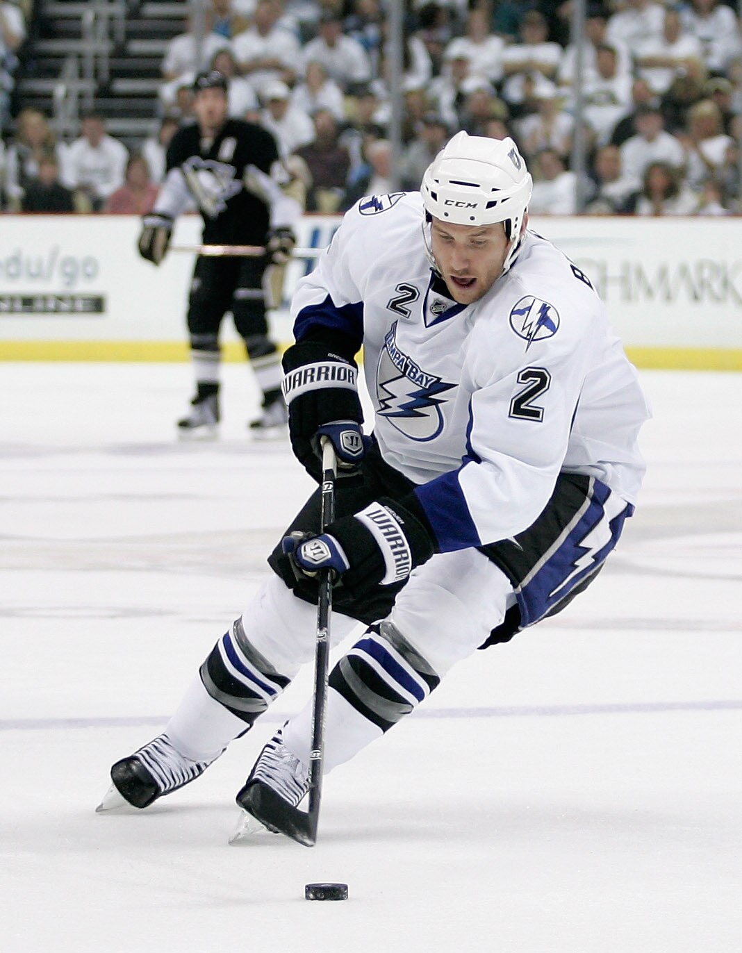 PITTSBURGH, PA - APRIL 15:  Eric Brewer#2 of the Tampa Bay Lightning controls the puck during Game Two of the Eastern Conference Quarterfinals against the  Pittsburgh Penguins during the 2011 NHL Stanley Cup Playoffs at Consol Energy Center on April 15, 2
