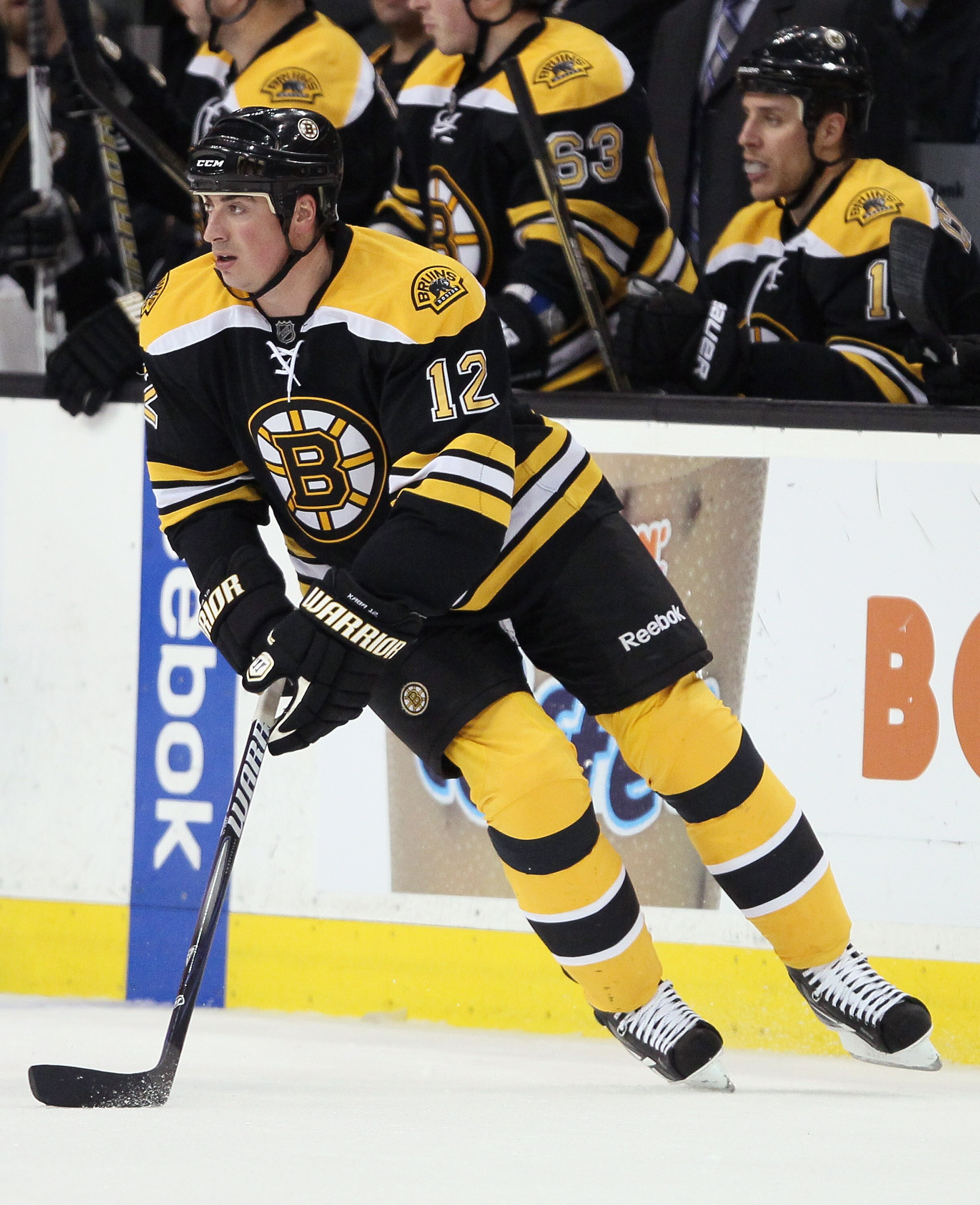 BOSTON, MA - MARCH 24: Tomas Kaberle #12 of the Boston Bruins takes the puck in the second period against the Montreal Canadiens on March 24, 2011 at the TD Garden in Boston, Massachusetts.  (Photo by Elsa/Getty Images)