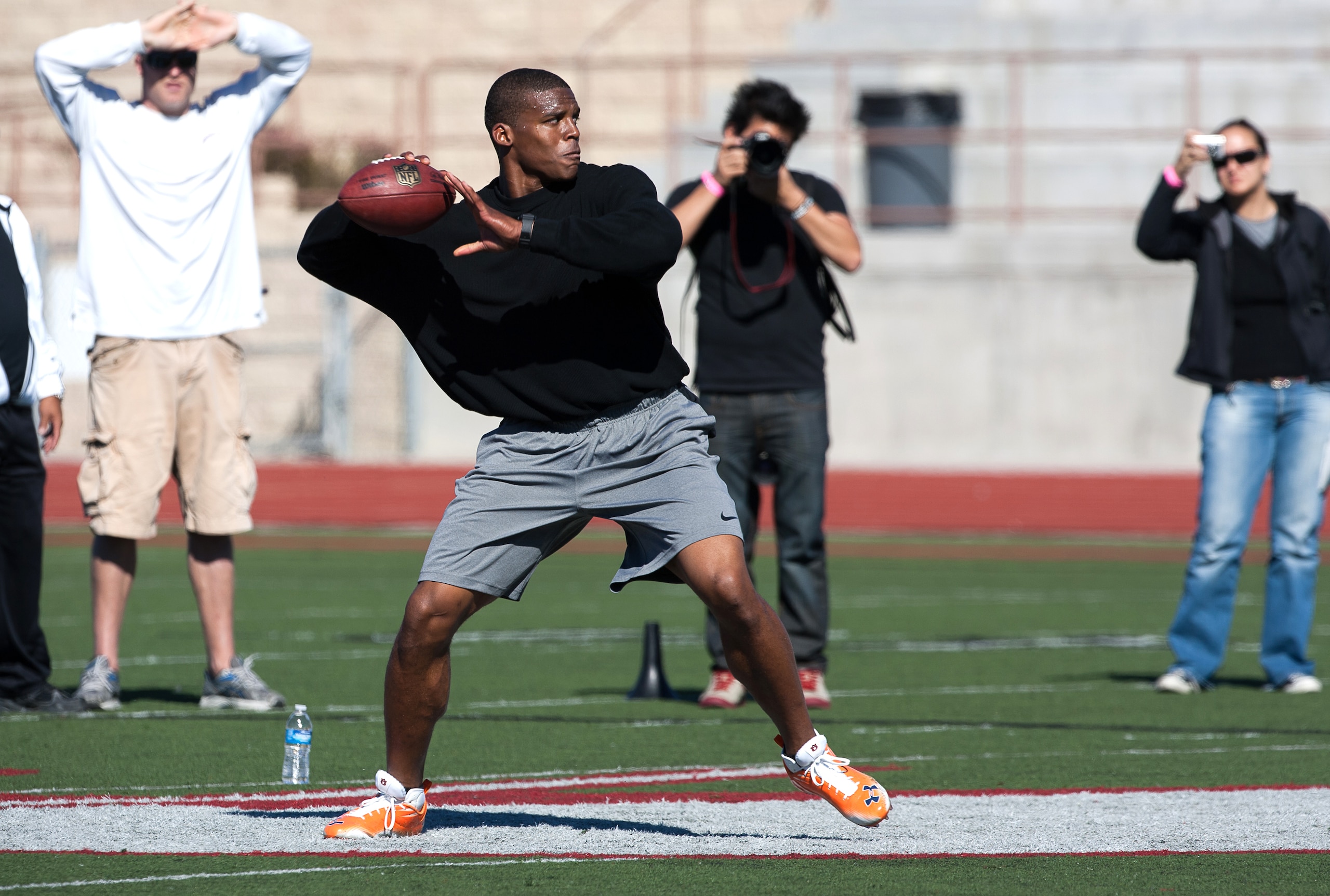 SAN DIEGO, CA - FEBRUARY 10: 2010 Heisman Trophy winning quarterback Cam Newton of Auburn throws the ball during his workout routine for the media at Cathedral High School's sports stadium on February 10, 2011 in San Diego, California. (Photo by Kent Horn SAN DIEGO, CA - FEBRUARY 10: 2010 Heisman Trophy winning quarterback Cam Newton of Auburn throws the ball during his workout routine for the media at Cathedral High School's sports stadium on February 10, 2011 in San Diego, California. (Photo by Kent Horn