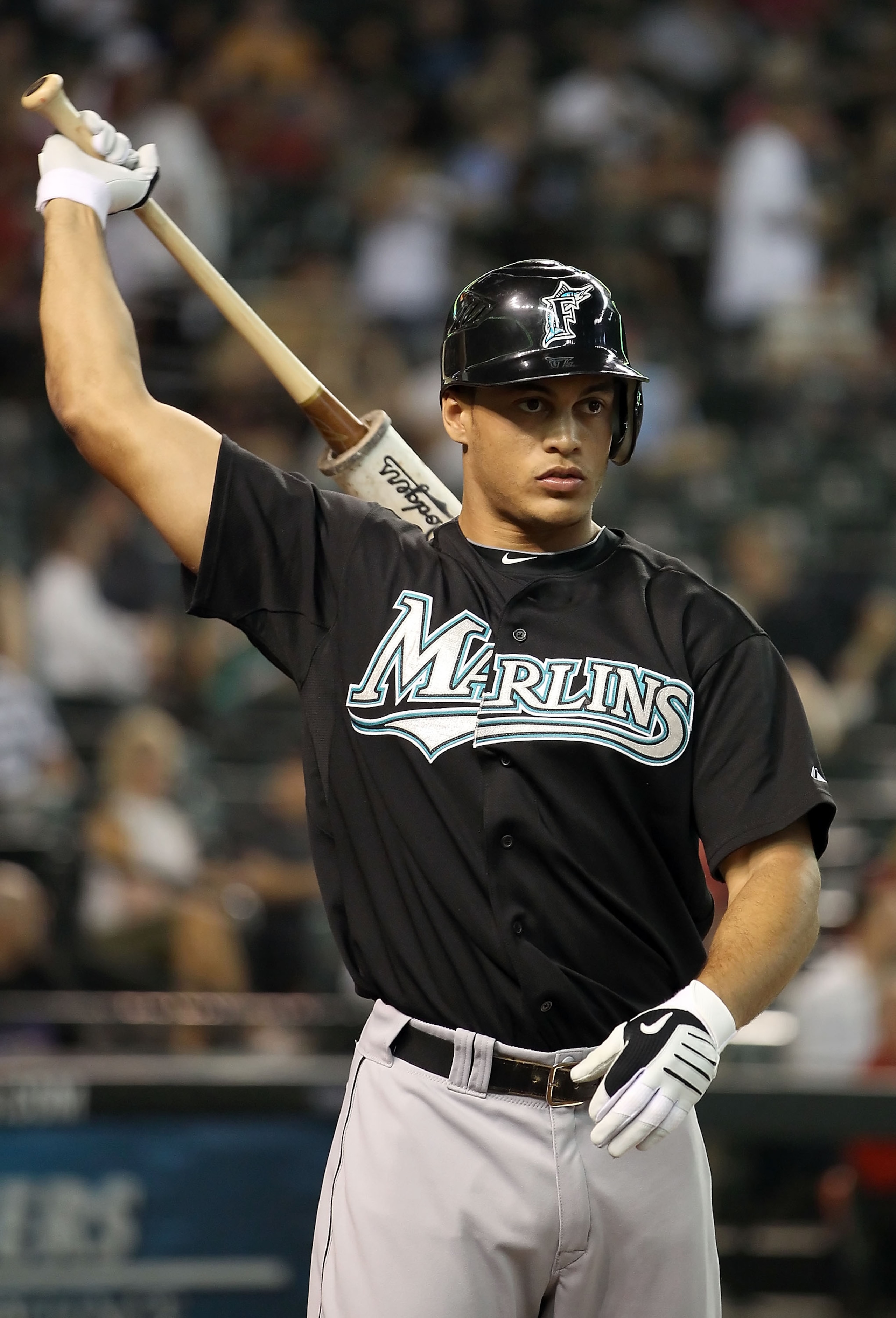 PHOENIX - JULY 08:  Mike Stanton #27 of the Florida Marlins warms up on deck during the Major League Baseball game against the Arizona Diamondbacks at Chase Field on July 8, 2010 in Phoenix, Arizona. The Diamondbacks defeated the Marlins 10-4.  (Photo by 
