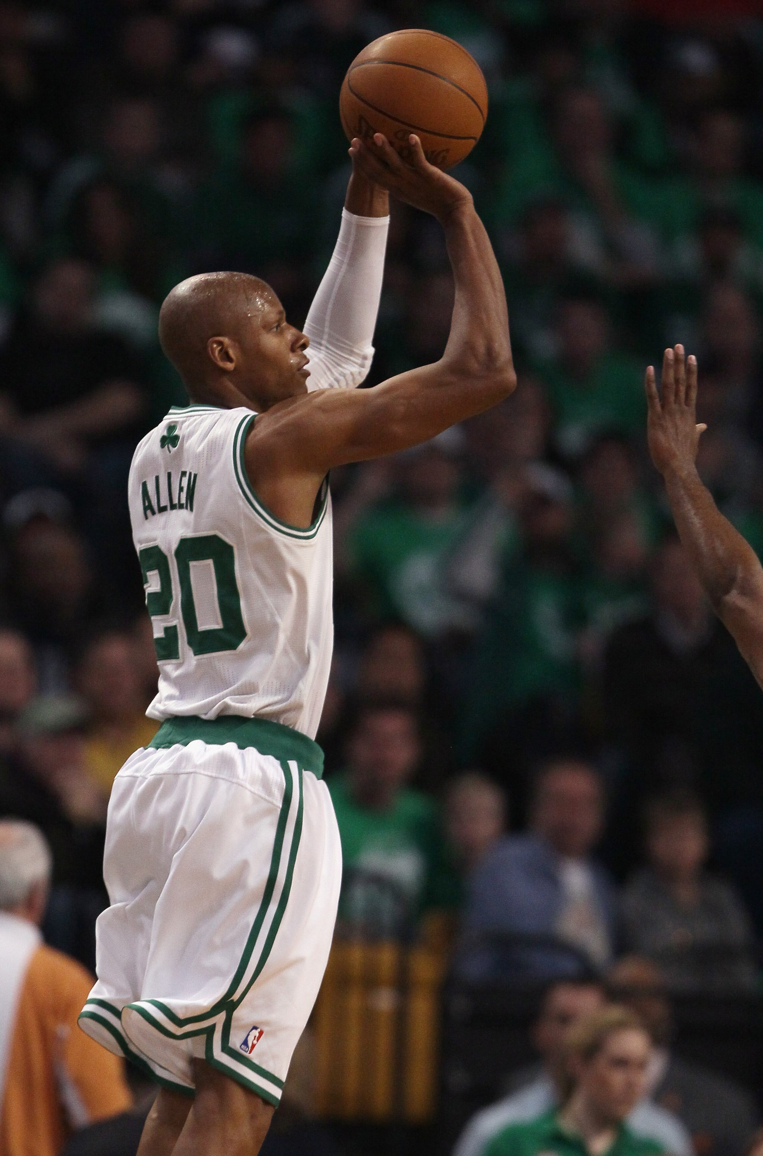 BOSTON, MA - APRIL 17:  Ray Allen #20 of the Boston Celtics shoots a three point shot in the second half againsts the New York Knicks in Game One of the Eastern Conference Quarterfinals in the 2011 NBA Playoffs on April 17, 2011 at the TD Garden in Boston