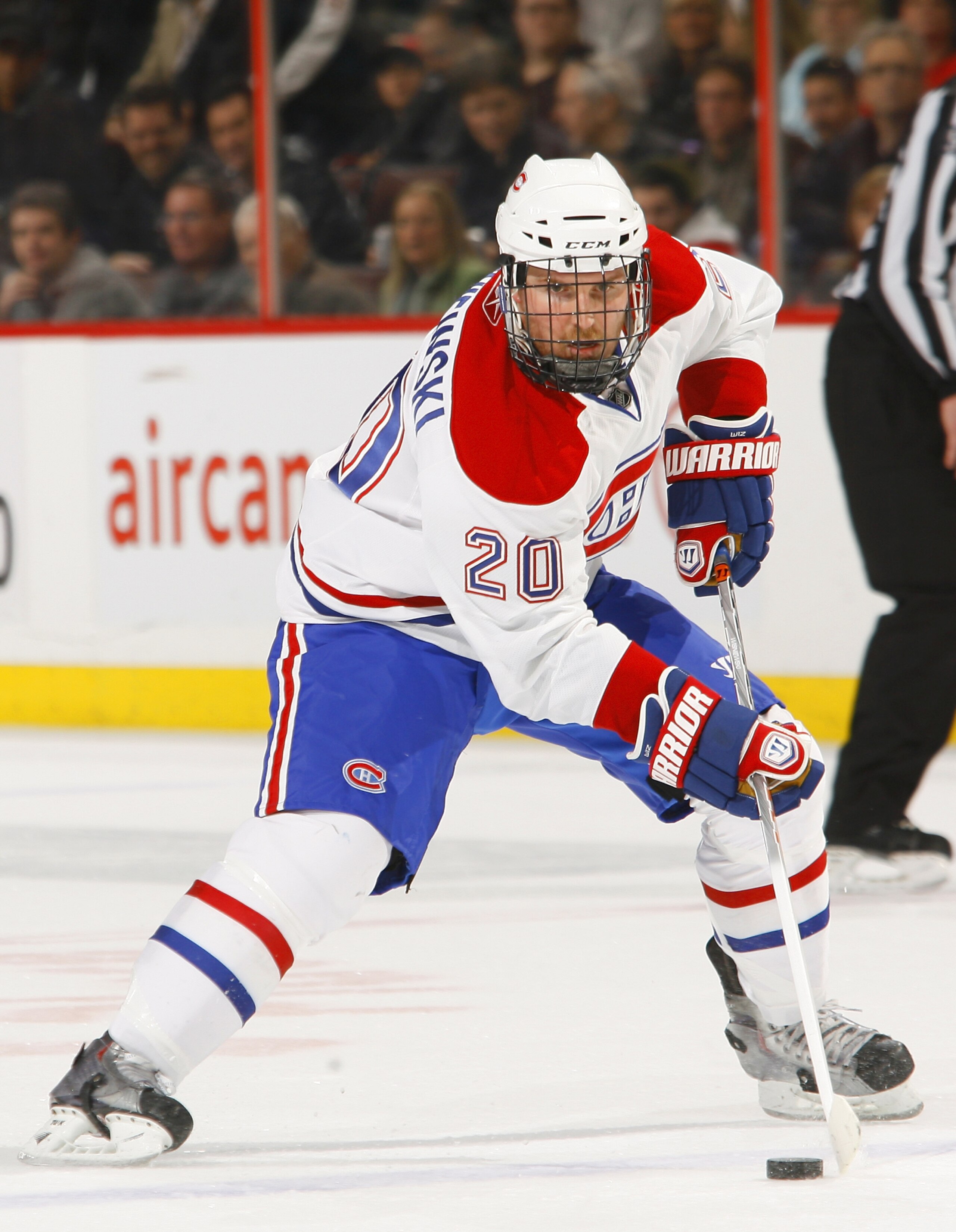 OTTAWA, CANADA - APRIL 07:  James Wisniewski #20 of the Montreal Canadiens carries the puck up ice in a game against the Ottawa Senators at Scotiabank Place on April 7, 2011 in Ottawa, Canada.  (Photo by Phillip MacCallum/Getty Images)