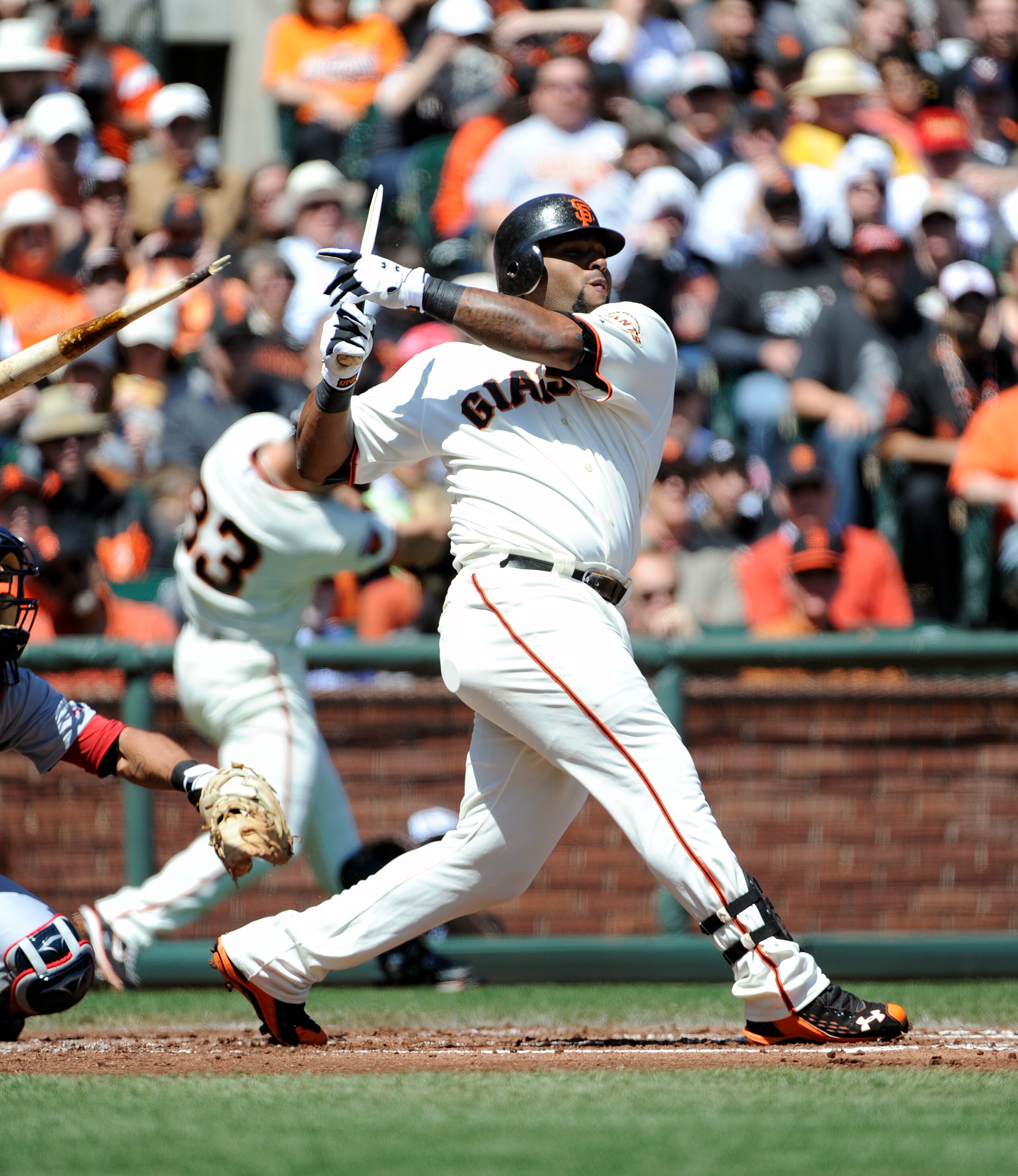 SAN FRANCISCO, CA - APRIL 10:  Pablo Sandoval #48 of the San Francisco Giants breaks his bat but singles to drive in a run in the bottom of the first inning against the St. Louis Cardinals during a MLB baseball game at AT&T Park April 10, 2011 in San Fran