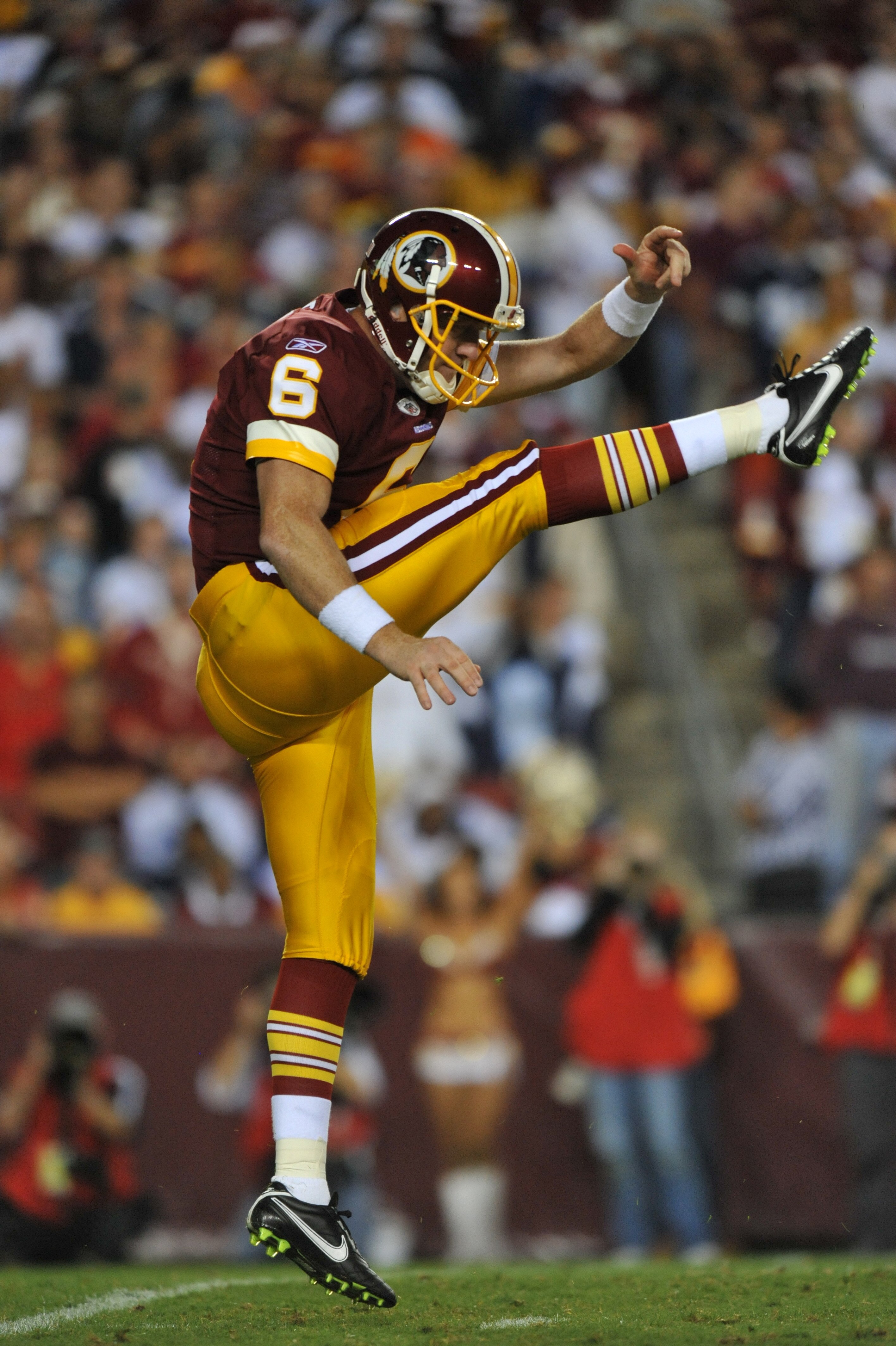 LANDOVER - SEPTEMBER 12:  Josh Bidwell #6 of the Washington Redskins punts during the NFL season opener against the Dallas Cowboys at FedExField on September 12, 2010 in Landover, Maryland. The Redskins defeated the Cowboys 13-7. (Photo by Larry French/Ge