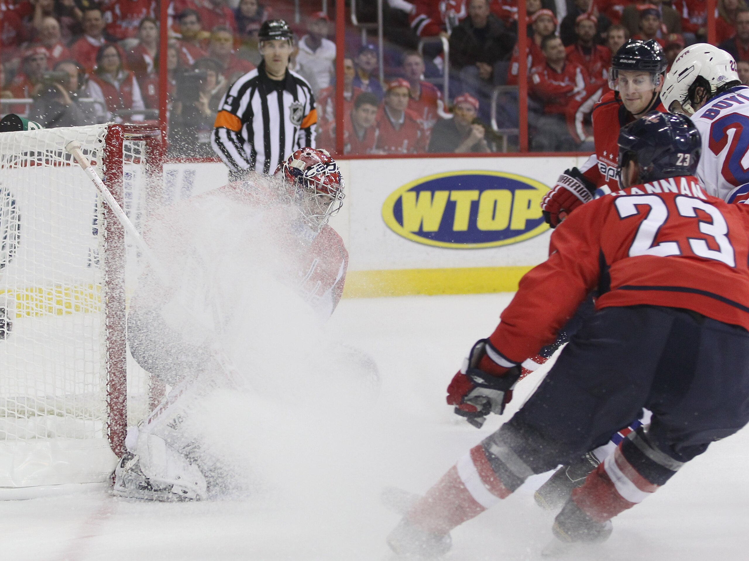 WASHINGTON, DC - APRIL 15:  Michal Neuvirth #30 of the Washington Capitals is covered in snow in the game against the Washington Capitals in Game Two of the Eastern Conference Quarterfinals during the 2011 NHL Stanley Cup Playoffs at Verizon Center on Apr
