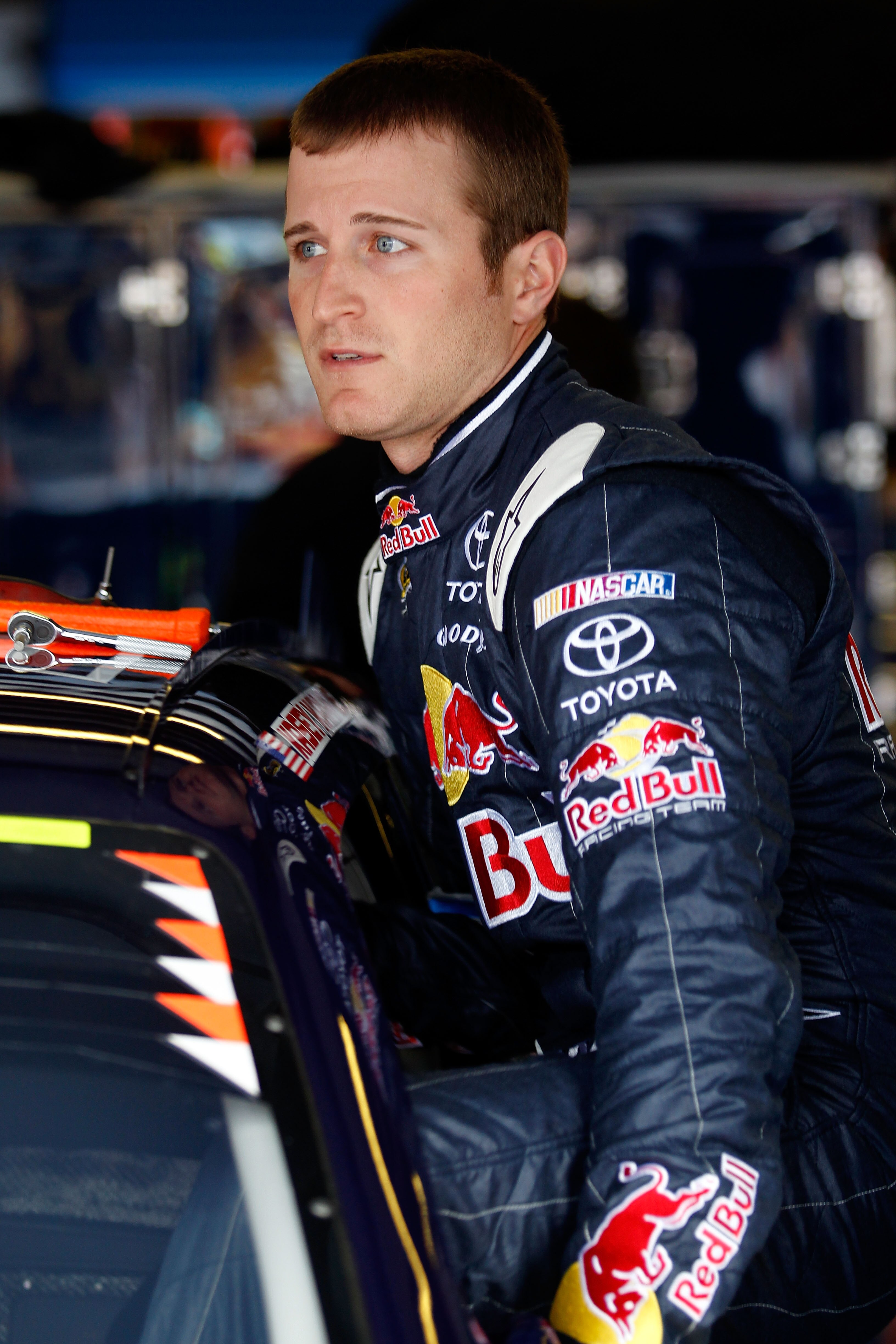 TALLADEGA, AL - APRIL 15:  Kasey Kahne, driver of the #4 Red Bull Toyota, climbs in his car during practice for the NASCAR Sprint Cup Series Aaron's 499 at Talladega Superspeedway on April 15, 2011 in Talladega, Alabama.  (Photo by Todd Warshaw/Getty Imag