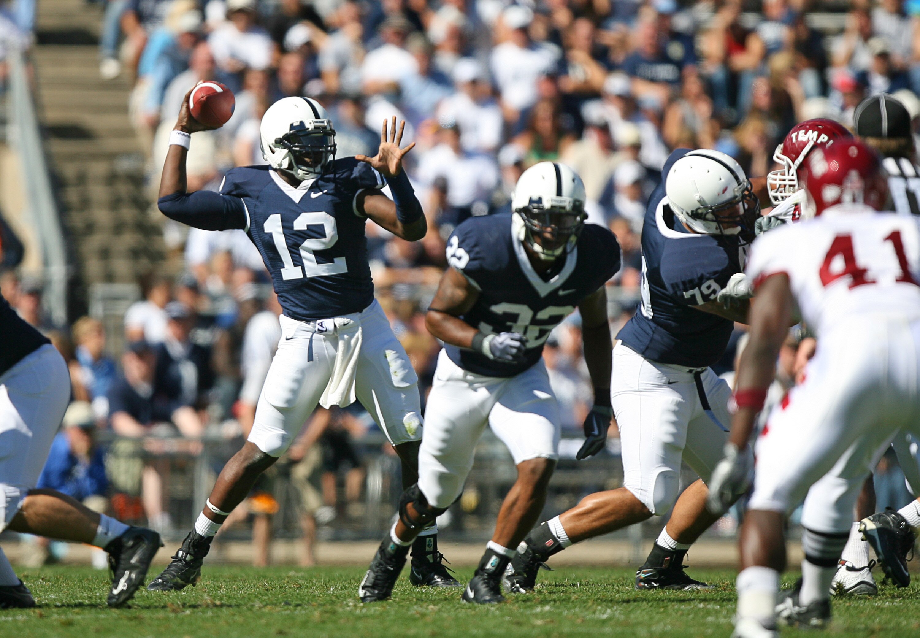 STATE COLLEGE, PA - SEPTEMBER 19: Quarterback Kevin Newsome #12 of the Penn State Nittany Lions throws a pass during a game against the Temple Owls on September 19, 2009 at Beaver Stadium in State College, Pennsylvania. (Photo by Hunter Martin/Getty Image