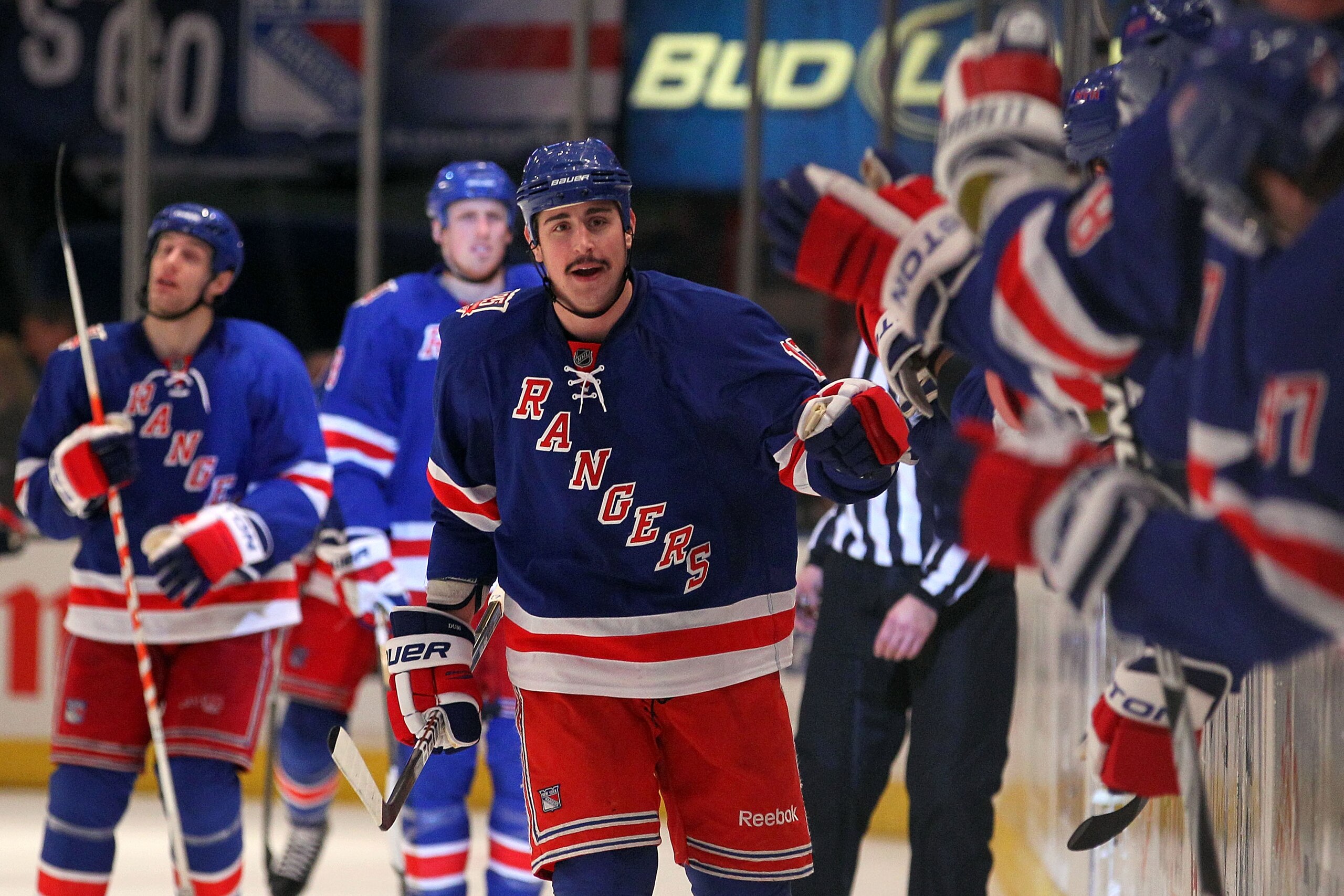NEW YORK, NY - APRIL 17:  Brandon Dubinsky #17 of the New York Rangers celebrates with teammates on the bench after he scored the game winning goal against the Washington Capitals in Game Three of the Eastern Conference Quarterfinals during the 2011 NHL S
