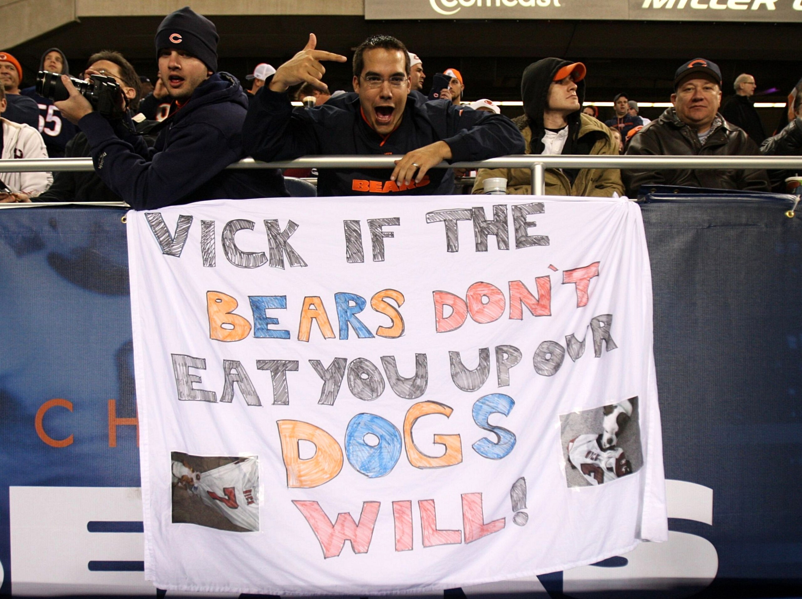CHICAGO - NOVEMBER 22: Fans of the Chicago Bears hang a sign which reads 'Vick If The Bears Don't Eat You Up Our Dogs Will!' in reference to Michael VIck #7 of the Philadelphia Eagles at Soldier Field on November 22, 2009 in Chicago, Illinois.  (Photo by