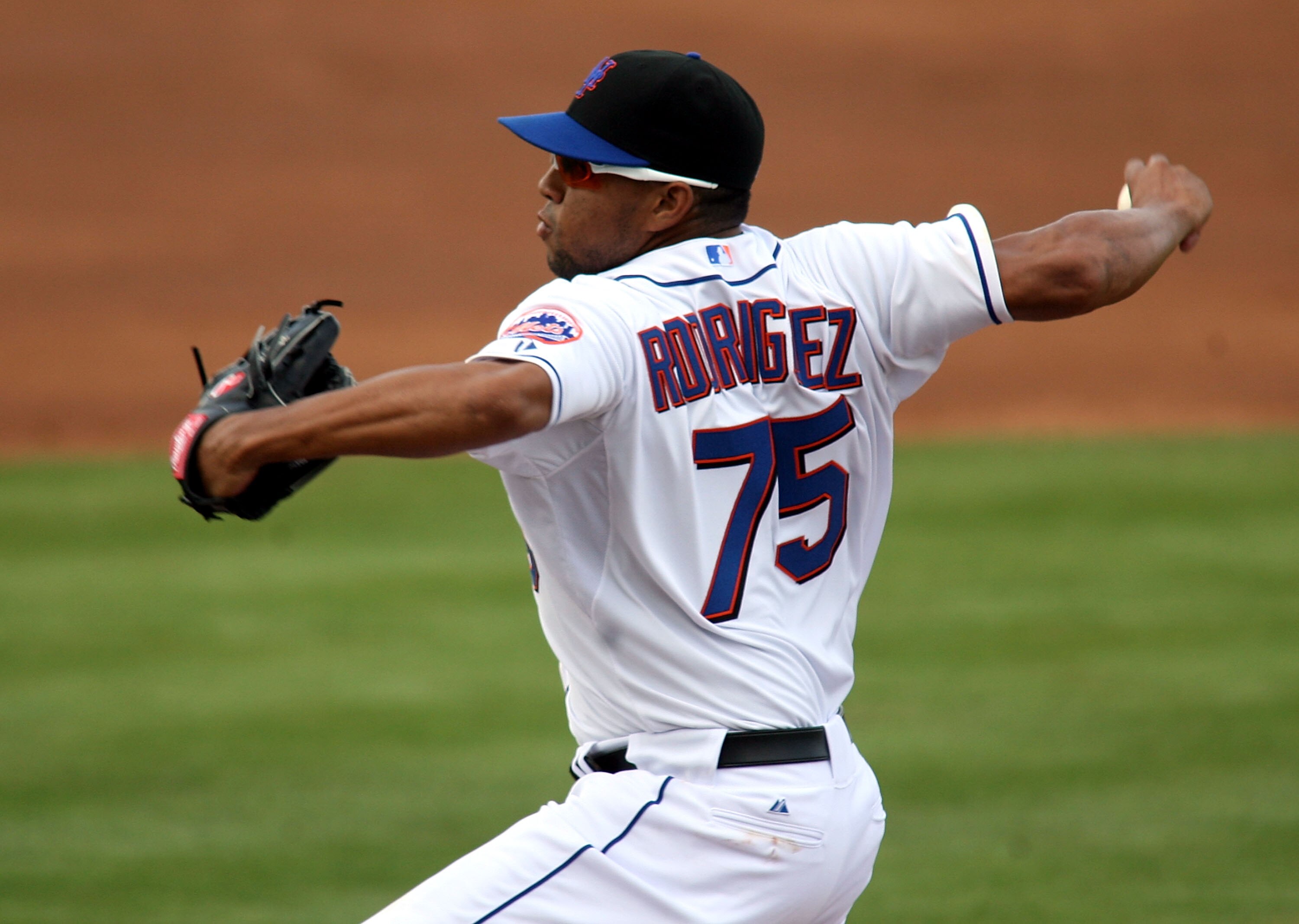 PORT ST. LUCIE, FL - MARCH 03:  Pitcher Francisco Rodriguez #75 of the New York Mets throws against the St. Louis Cardinals at Digital Domain Park on March 3, 2011 in Port St. Lucie, Florida.  (Photo by Marc Serota/Getty Images)