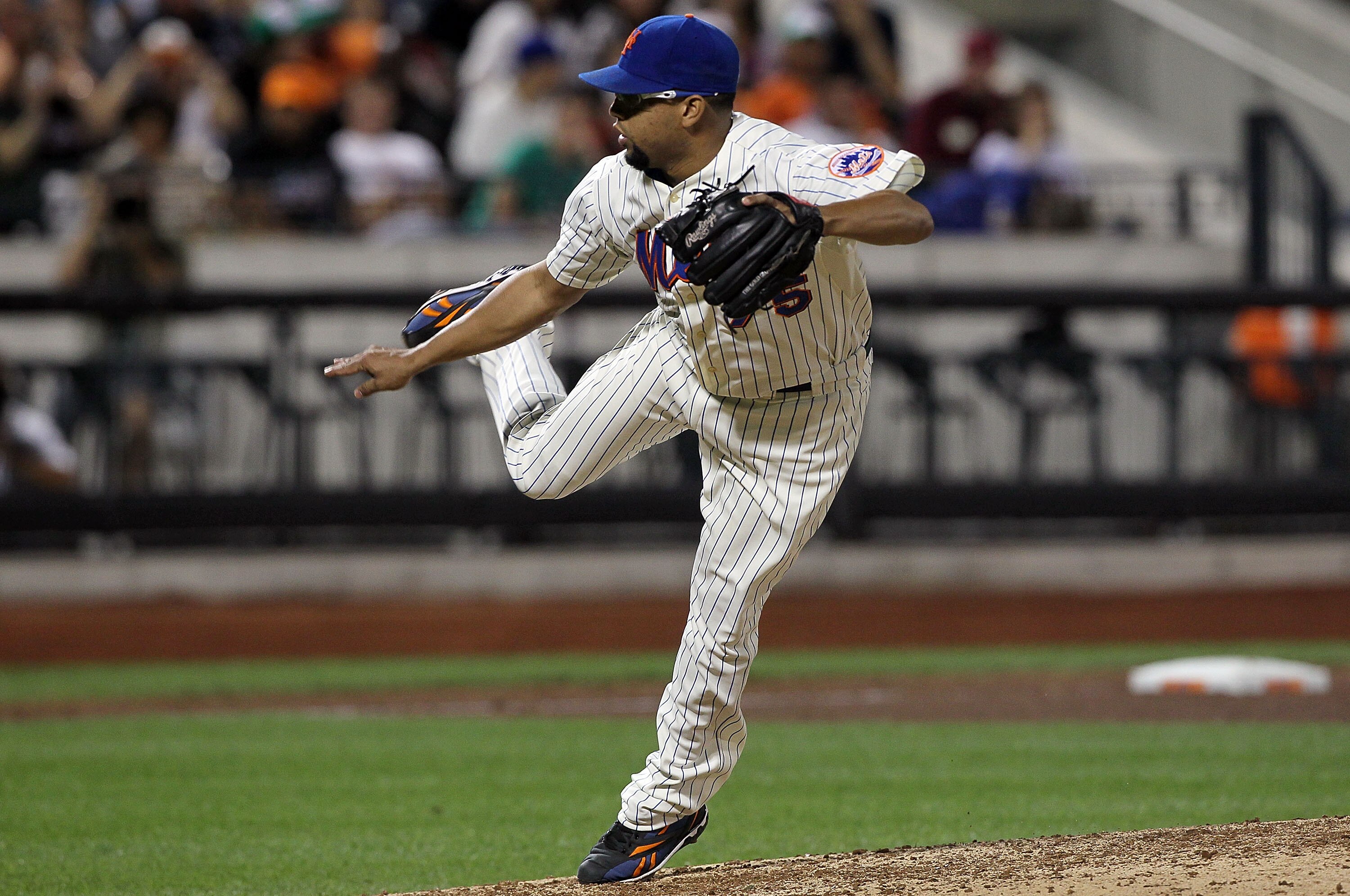 NEW YORK - AUGUST 14:  Francisco Rodriguez #75 of the New York Mets delivers a pitch in the ninth inning against the Philadelphia Phillies on August 14, 2010 at Citi Field in the Flushing neighborhood of the Queens borough of New York City. The Phillies d