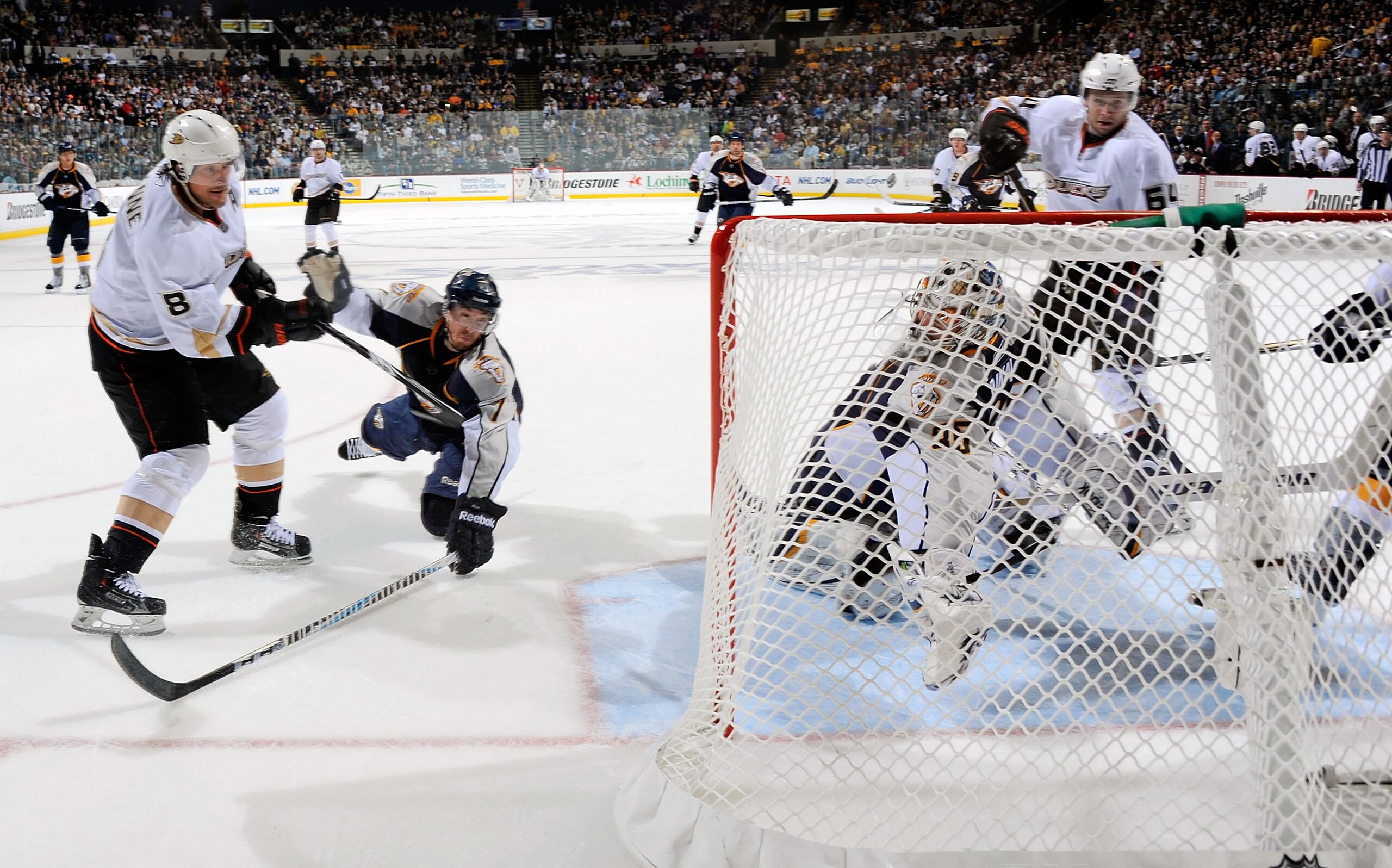 NASHVILLE, TN - APRIL 17:  Teemu Selanne #8 of the Anaheim Ducks shoots the puck past Jonathon Blum #7 of the Nashville Predators and into the net behind Predators goalie Pekke Rinne #35 in Game Three of the Western Conference Quarterfinals during the 201