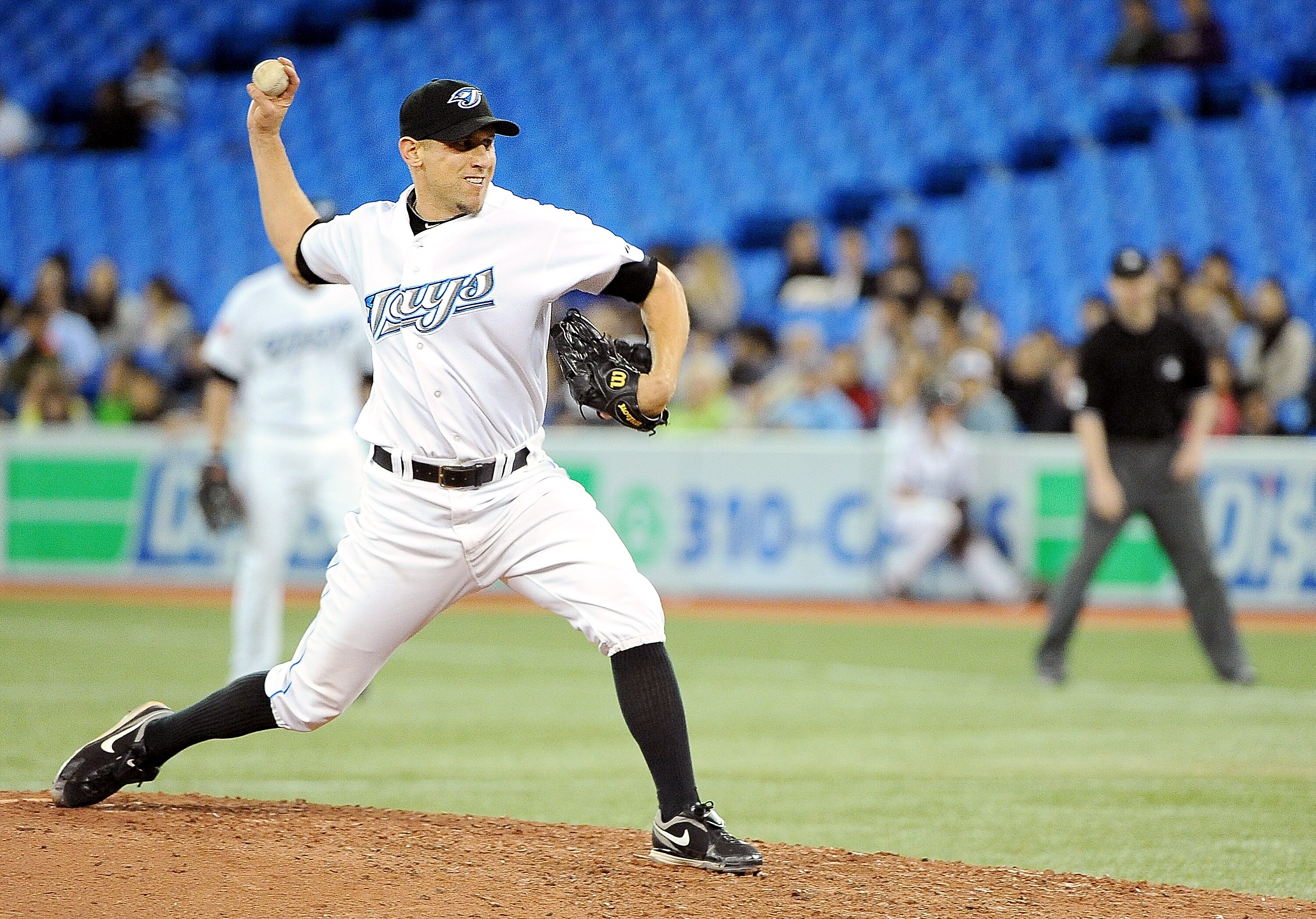 TORONTO, ON - SEPTEMBER 22: Shawn Camp #57 of the Toronto Blue Jays delivers a pitch on September 22, 2010 at the Rogers Centre in Toronto, Canada. (Photo by Matthew Manor/Getty Images)