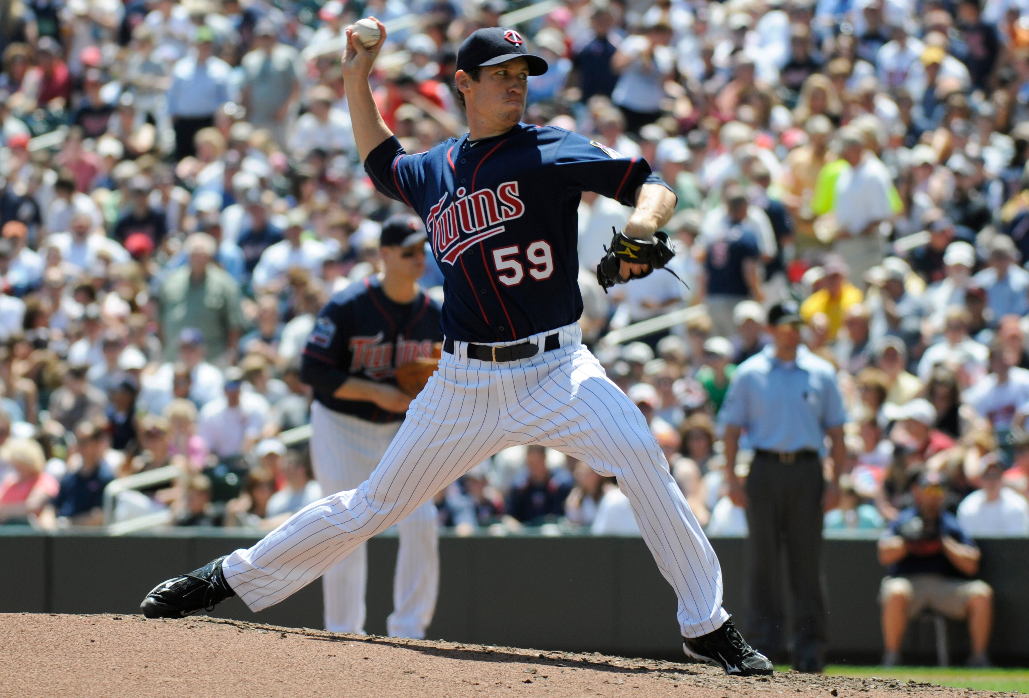MINNEAPOLIS, MN - JUNE 30: Kevin Slowey #59 of the Minnesota Twins pitches in the fourth inning against the Detroit Tigers during their game on June 30, 2010 at Target Field in Minneapolis, Minnesota. Twins won 5-1. (Photo by Hannah Foslien /Getty Images)