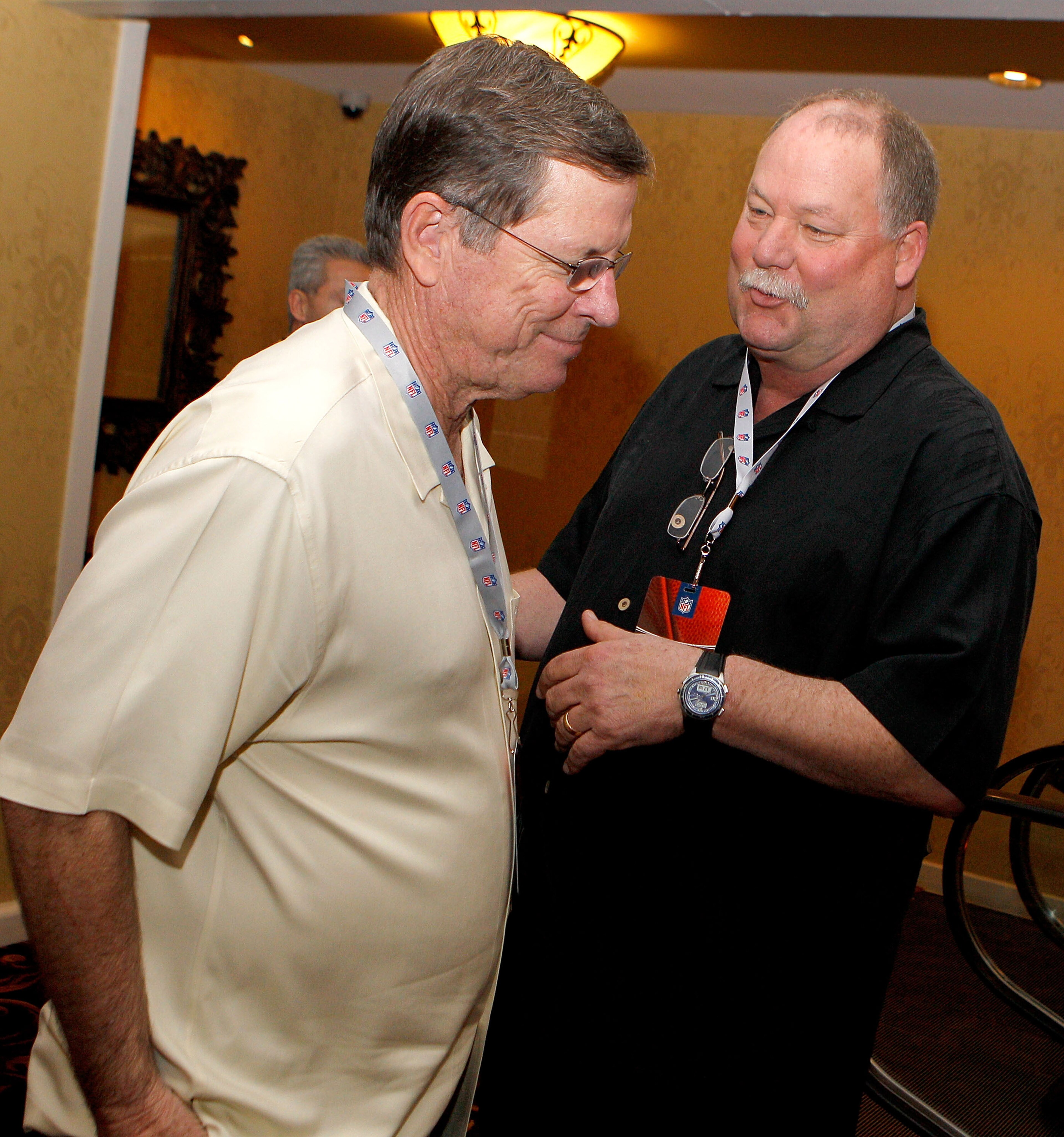NEW ORLEANS, LA - MARCH 21:  Cleveland Browns president Mike Holmgren speaks briefly with San Diego Chargers head coach Norv Turner while attending the NFL Annual Meetings at the Roosevelt HotelÊon March 21, 2011 in New Orleans, Louisiana. Despite a NFL o