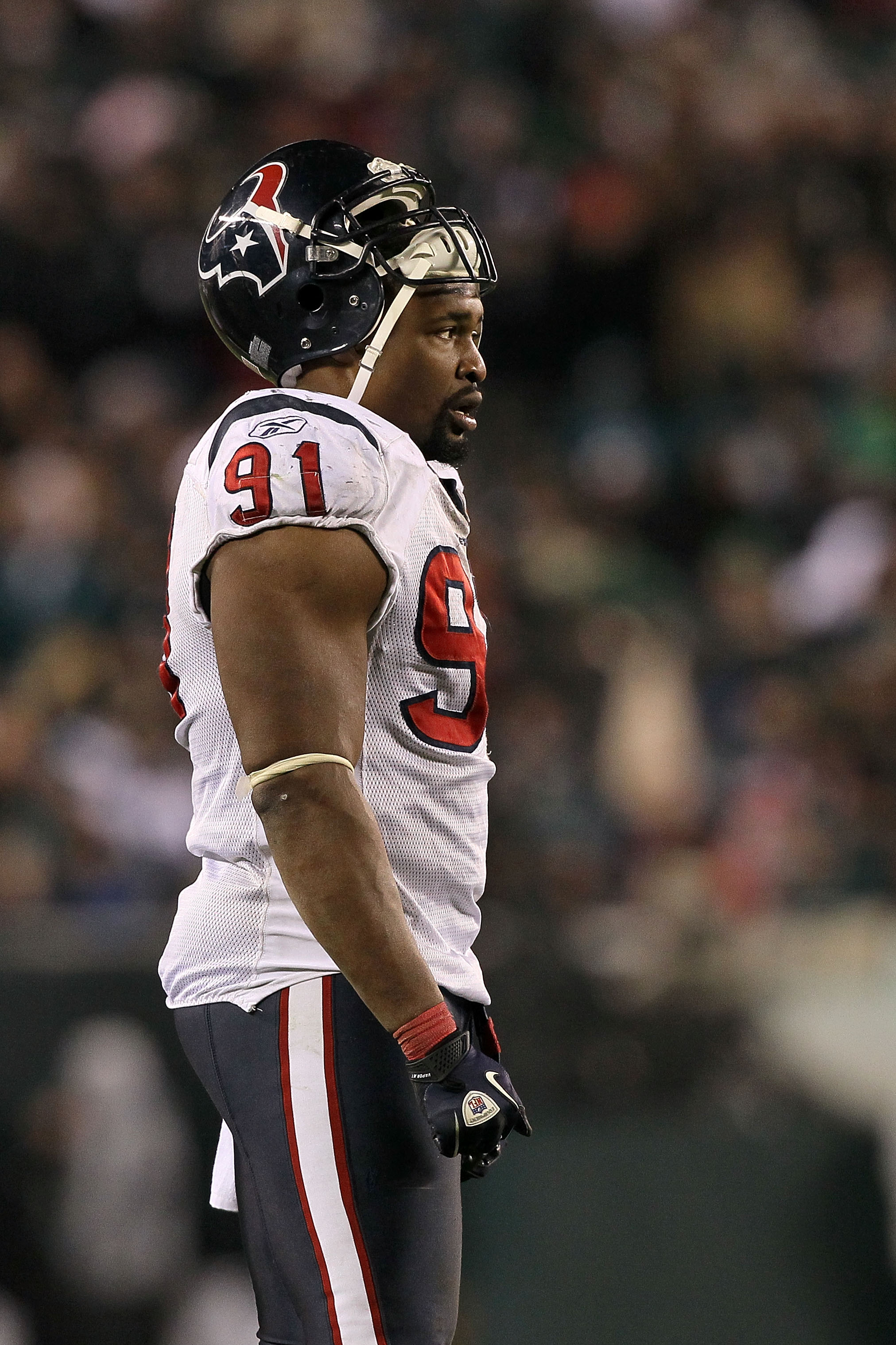 PHILADELPHIA, PA - DECEMBER 02:  Amobi Okoye #91 of the Houston Texans looks on against the Philadelphia Eagles at Lincoln Financial Field on December 2, 2010 in Philadelphia, Pennsylvania.  (Photo by Jim McIsaac/Getty Images)