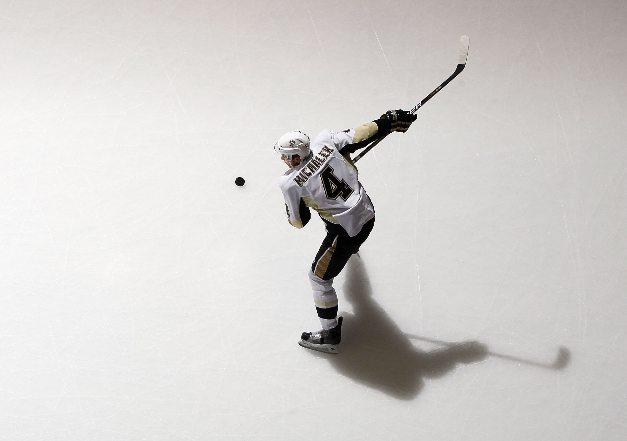 UNIONDALE, NY - FEBRUARY 11:  Zbynek Michalek #4 of the Pittsburgh Penguins warms up before playing against the New York Islanders on February 11, 2011 at Nassau Coliseum in Uniondale, New York.  (Photo by Jim McIsaac/Getty Images)