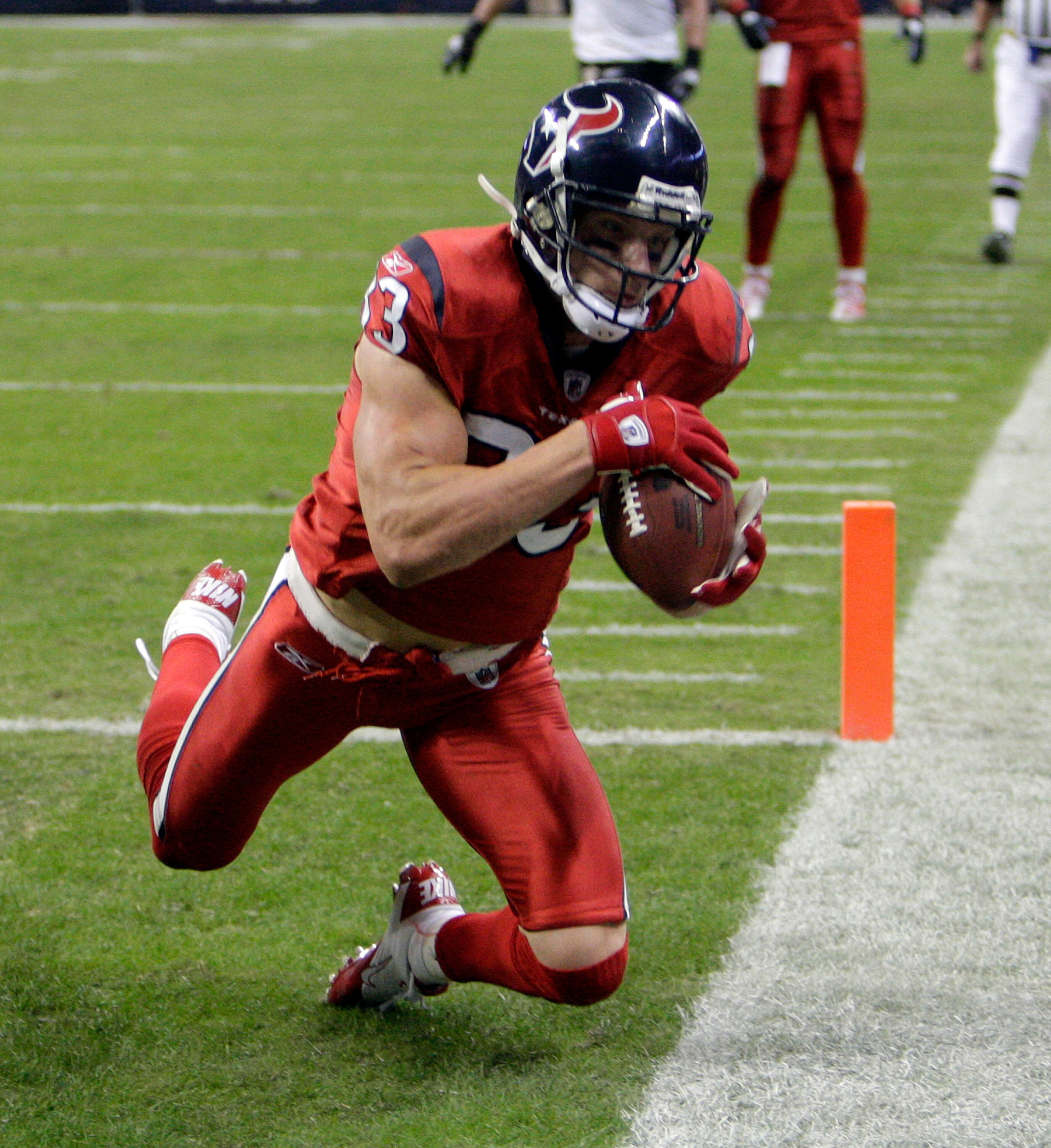 HOUSTON, TX - DECEMBER 13:  Wide receiver  Kevin Walter #83 of the Houston Texans completes a pass in the rear of the endzone but was ruled out of bounds on instant replay during action against the Baltimore Ravens at Reliant Stadium on December 13, 2010