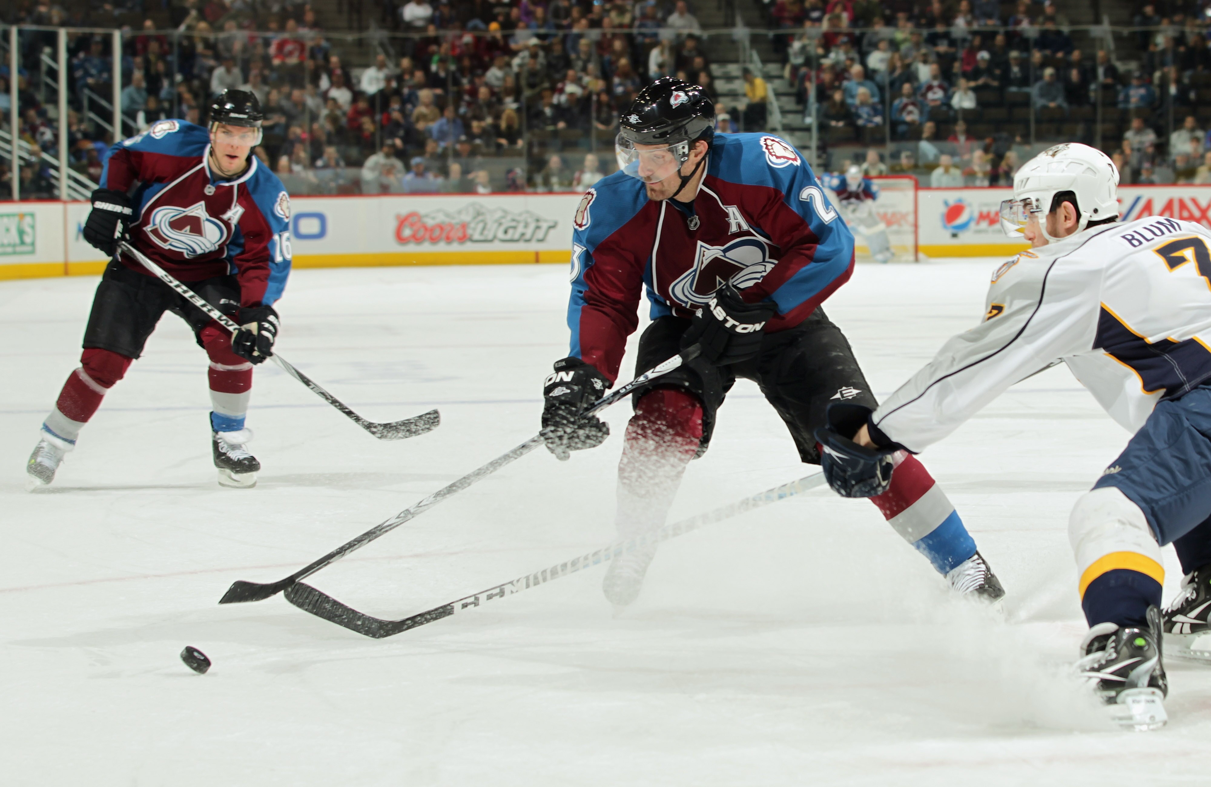 DENVER, CO - MARCH 31:  Milan Hejduk #23 of the Colorado Avalanche contrlols the puck as Jonathon Blum #7 of the Nashville Predators defends at the Pepsi Center on March 31, 2011 in Denver, Colorado.  (Photo by Doug Pensinger/Getty Images)