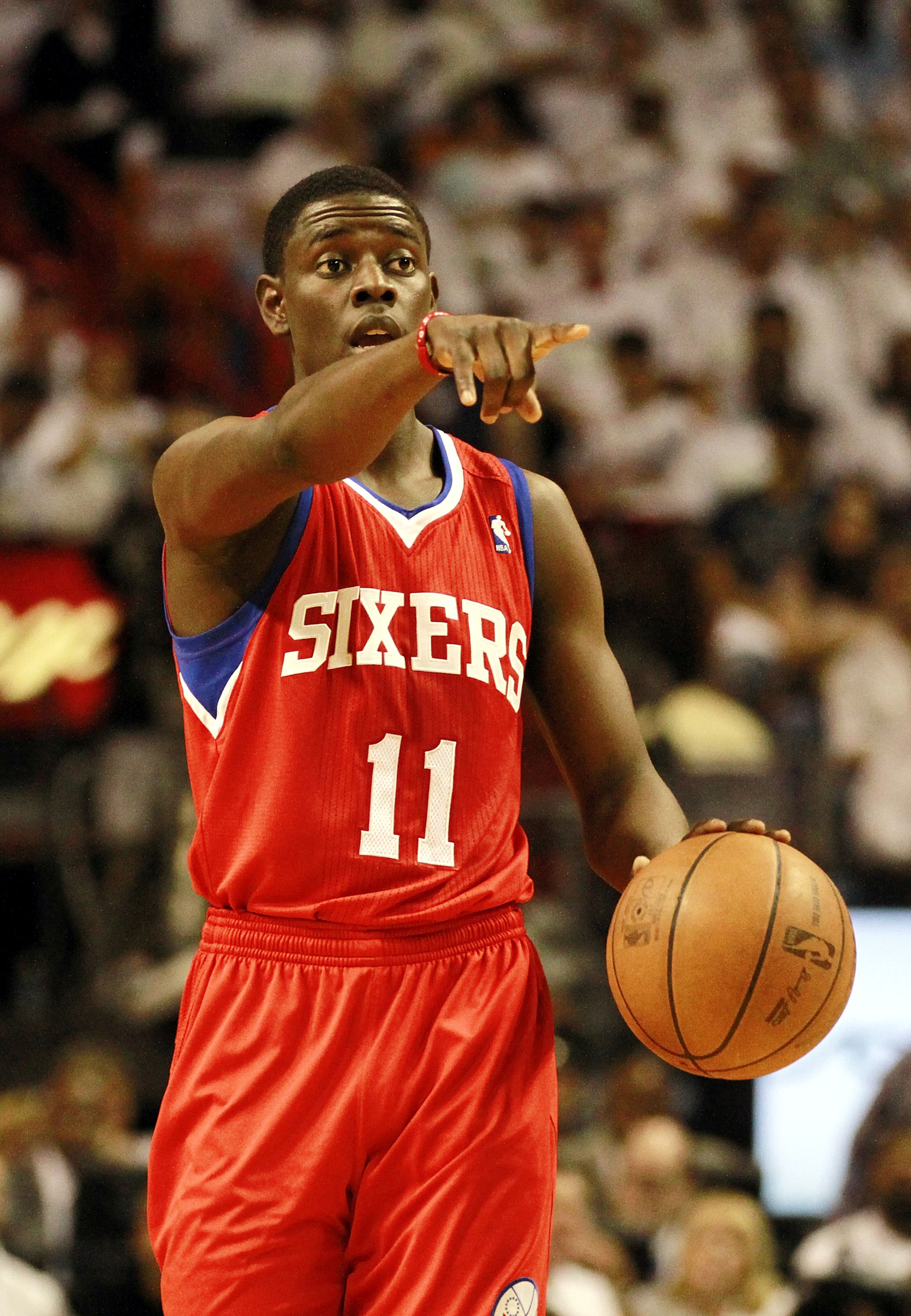 MIAMI, FL - APRIL 16: Guard Jrue Holiday #11 of the Philadelphia 76ers shouts during a game against the Maim Heat at the American Airlines Arena in game one of the Eastern Conference Quarterfinals in the 2011 NBA Playoffs on April 16, 2011 in Miami, Flori MIAMI, FL - APRIL 16: Guard Jrue Holiday #11 of the Philadelphia 76ers shouts during a game against the Maim Heat at the American Airlines Arena in game one of the Eastern Conference Quarterfinals in the 2011 NBA Playoffs on April 16, 2011 in Miami, Flori