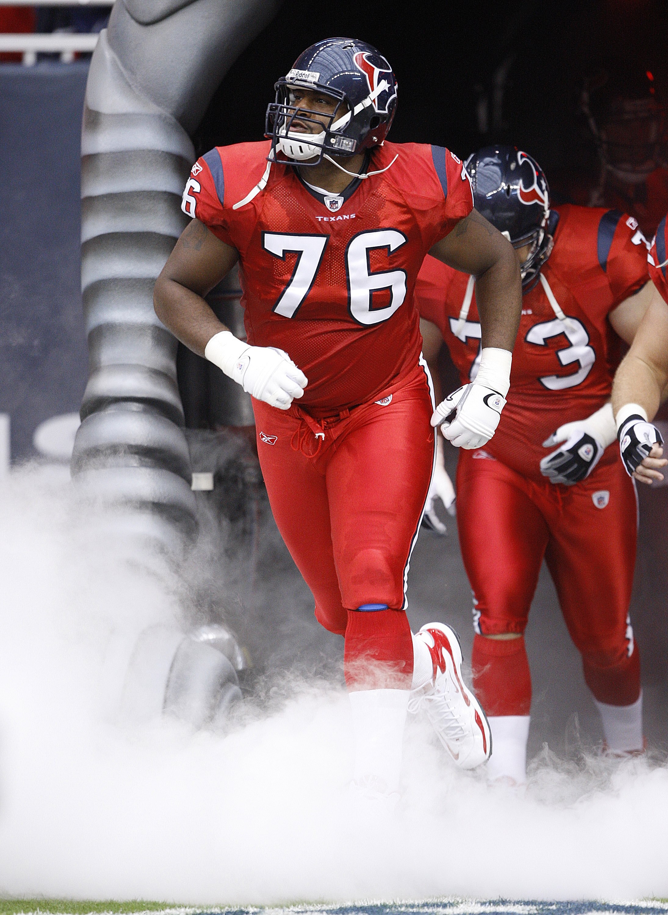 HOUSTON - SEPTEMBER 27:  Tackle Duane Brown #76 of the Houston Texans is introduced to the crowd before the game against the Jacksonville Jaguars at Reliant Stadium on September 27, 2009 in Houston, Texas.  (Photo by Bob Levey/Getty Images)