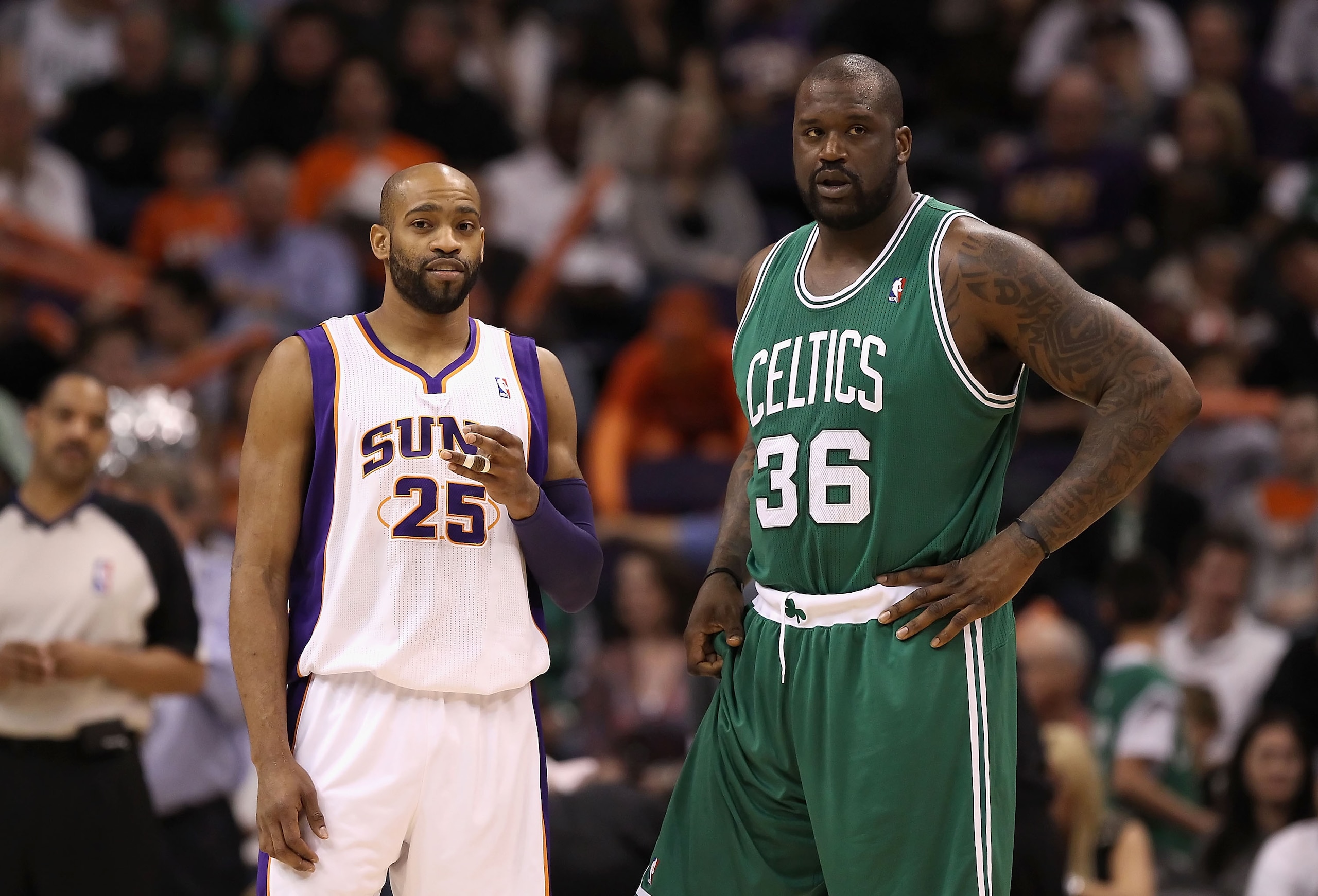 PHOENIX, AZ - JANUARY 28: Vince Carter #25 of the Phoenix Suns and Shaquille O'Neal #36 of the Boston Celtics during the NBA game at US Airways Center on January 28, 2011 in Phoenix, Arizona. The Suns defeated the Celtics 88-71. NOTE TO USER: User expr PHOENIX, AZ - JANUARY 28: Vince Carter #25 of the Phoenix Suns and Shaquille O'Neal #36 of the Boston Celtics during the NBA game at US Airways Center on January 28, 2011 in Phoenix, Arizona. The Suns defeated the Celtics 88-71. NOTE TO USER: User expr