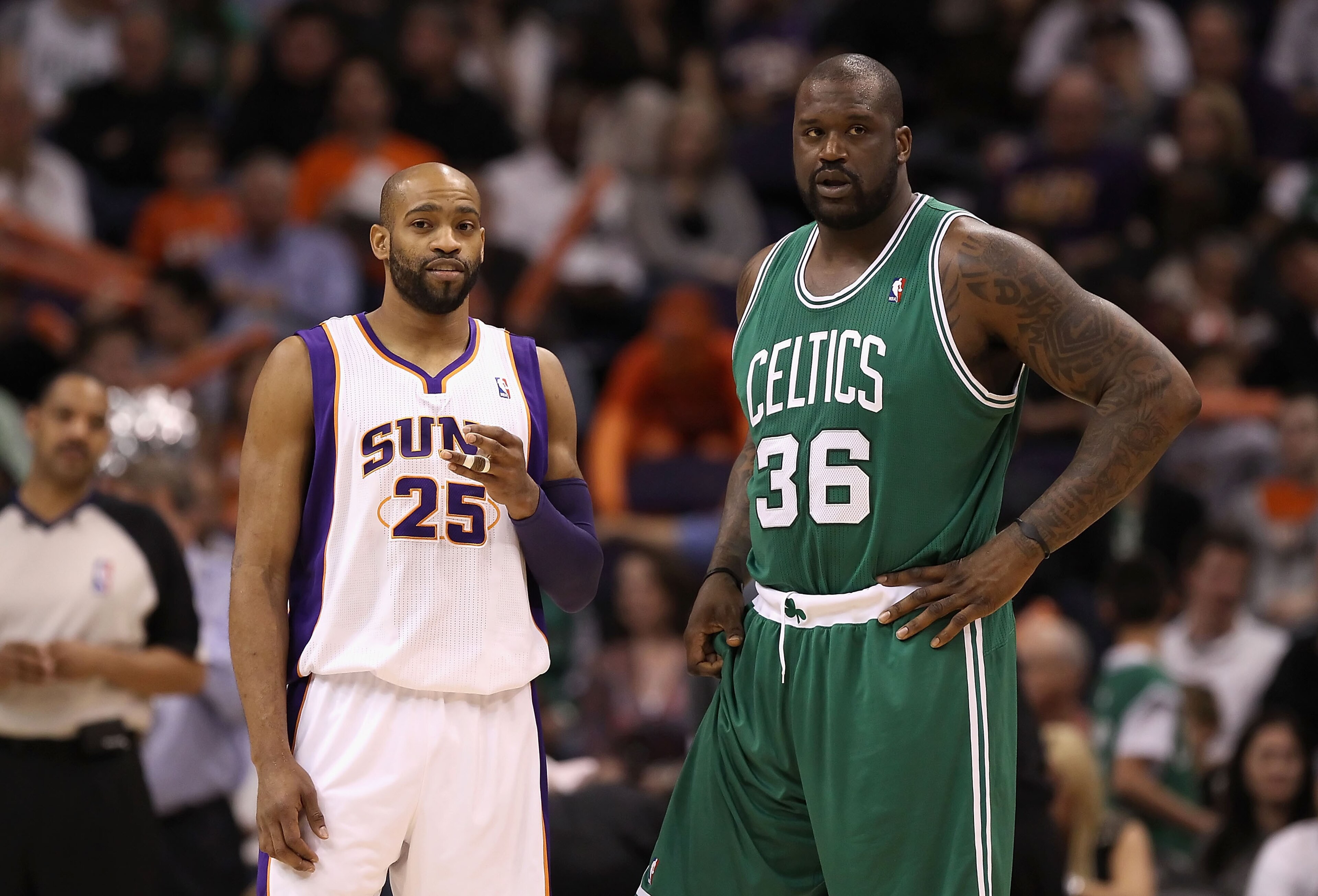 PHOENIX, AZ - JANUARY 28:  Vince Carter #25 of the Phoenix Suns and Shaquille O'Neal #36 of the Boston Celtics during the NBA game at US Airways Center on January 28, 2011 in Phoenix, Arizona.  The Suns defeated the Celtics 88-71.  NOTE TO USER: User expr