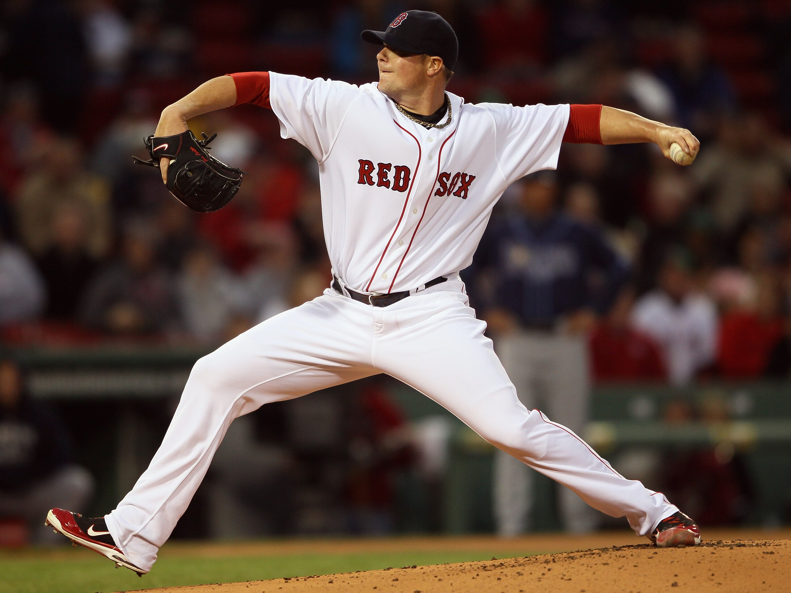 BOSTON, MA - APRIL 12: Jon Lester #31 of the Boston Red Sox delivers a pitch in the first inning against the Tampa Bay Rays on April 12, 2011 at Fenway Park in Boston, Massachusetts. (Photo by Elsa/Getty Images) BOSTON, MA - APRIL 12: Jon Lester #31 of the Boston Red Sox delivers a pitch in the first inning against the Tampa Bay Rays on April 12, 2011 at Fenway Park in Boston, Massachusetts. (Photo by Elsa/Getty Images)