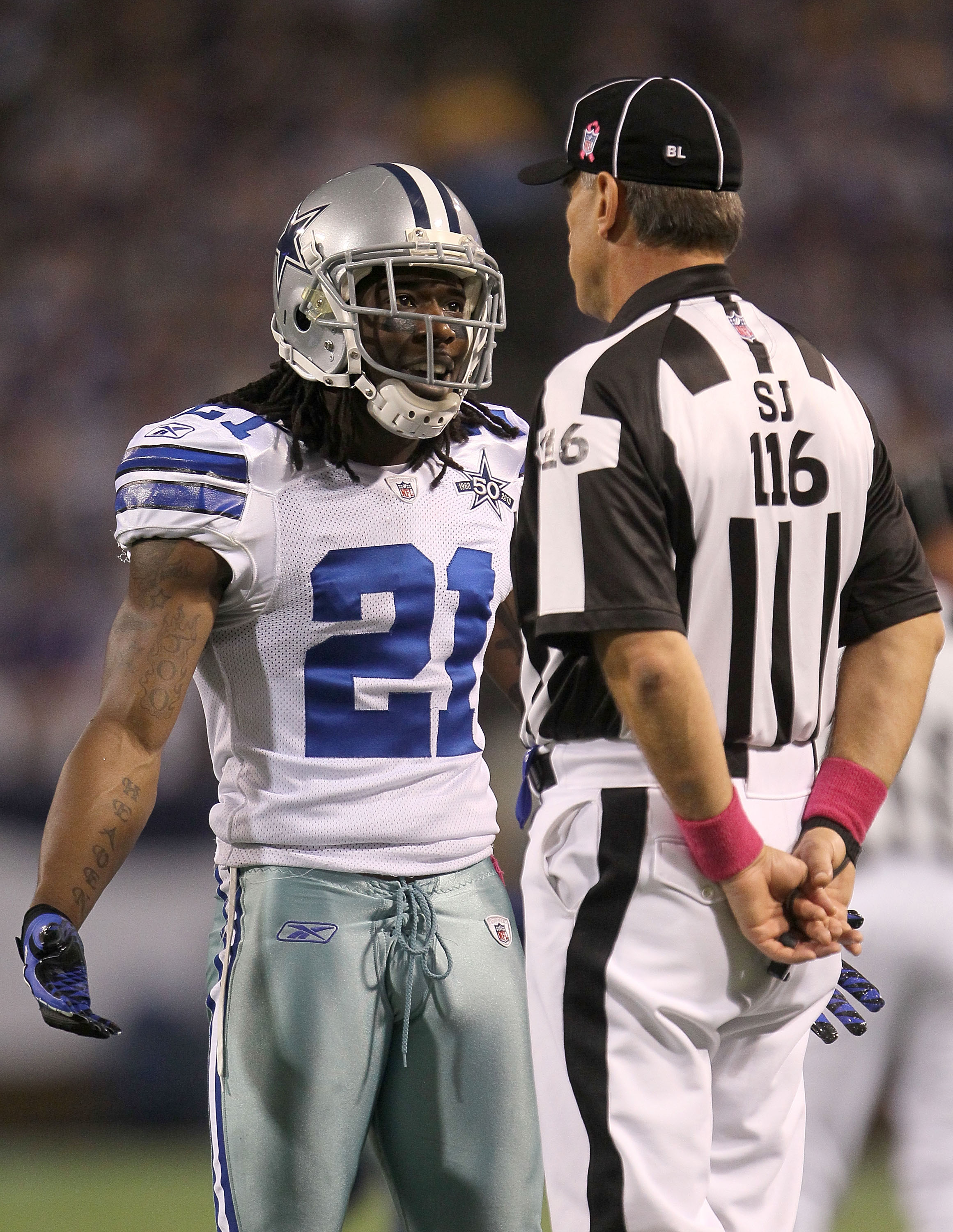 MINNEAPOLIS - OCTOBER 17:  Mike Jenkins #21 of the Dallas Cowboys argues with the referee during the game against the Minnesota Vikings at Mall of America Field on October 17, 2010 in Minneapolis, Minnesota.  (Photo by Jeff Gross/Getty Images)