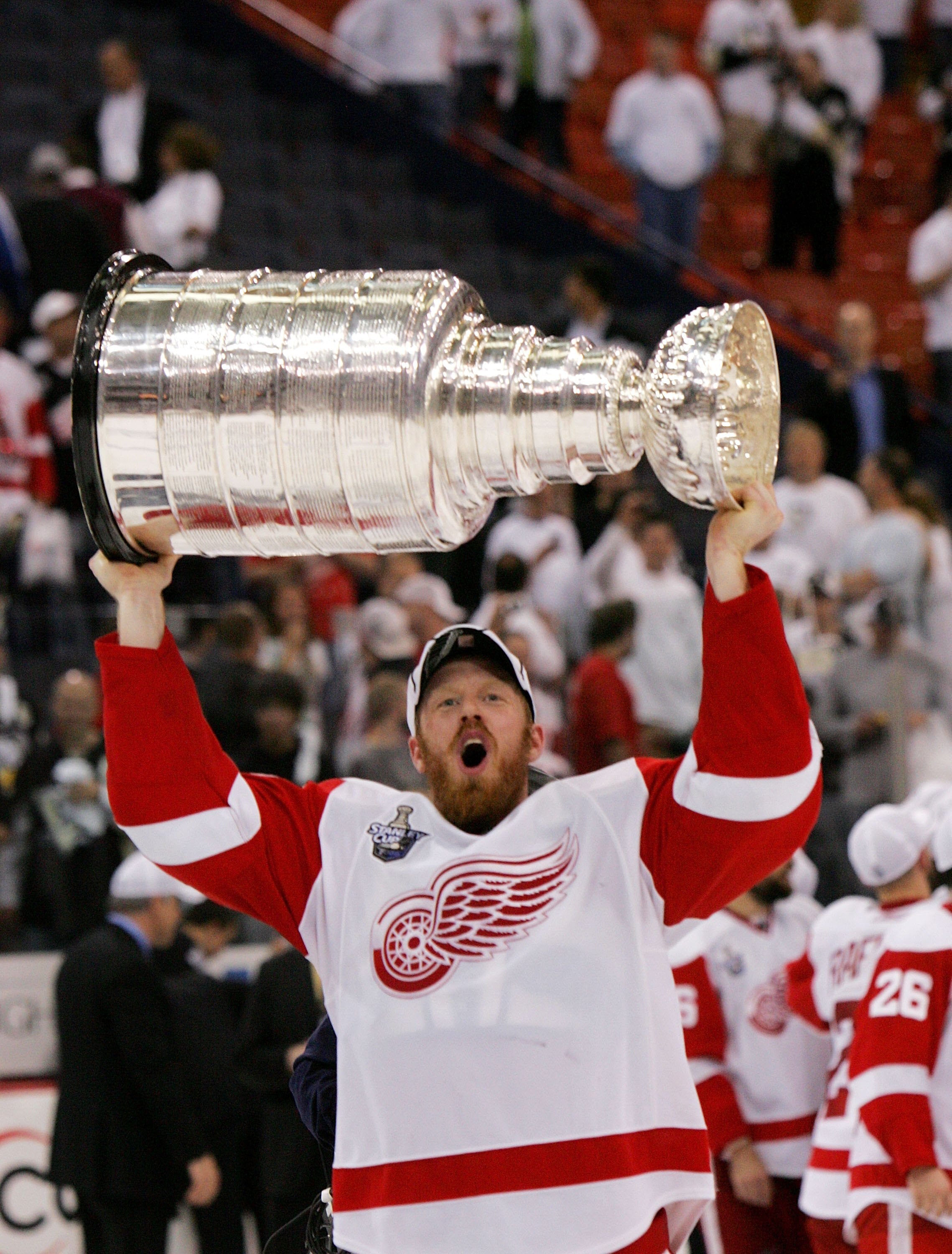 PITTSBURGH - JUNE 04: Johan Franzen #93 of the Detroit Red Wings celebrates with the Stanley Cup after defeating the Pittsburgh Penguins in game six of the 2008 NHL Stanley Cup Finals at Mellon Arena on June 4, 2008 in Pittsburgh. Pennsylvania. The Red Wi
