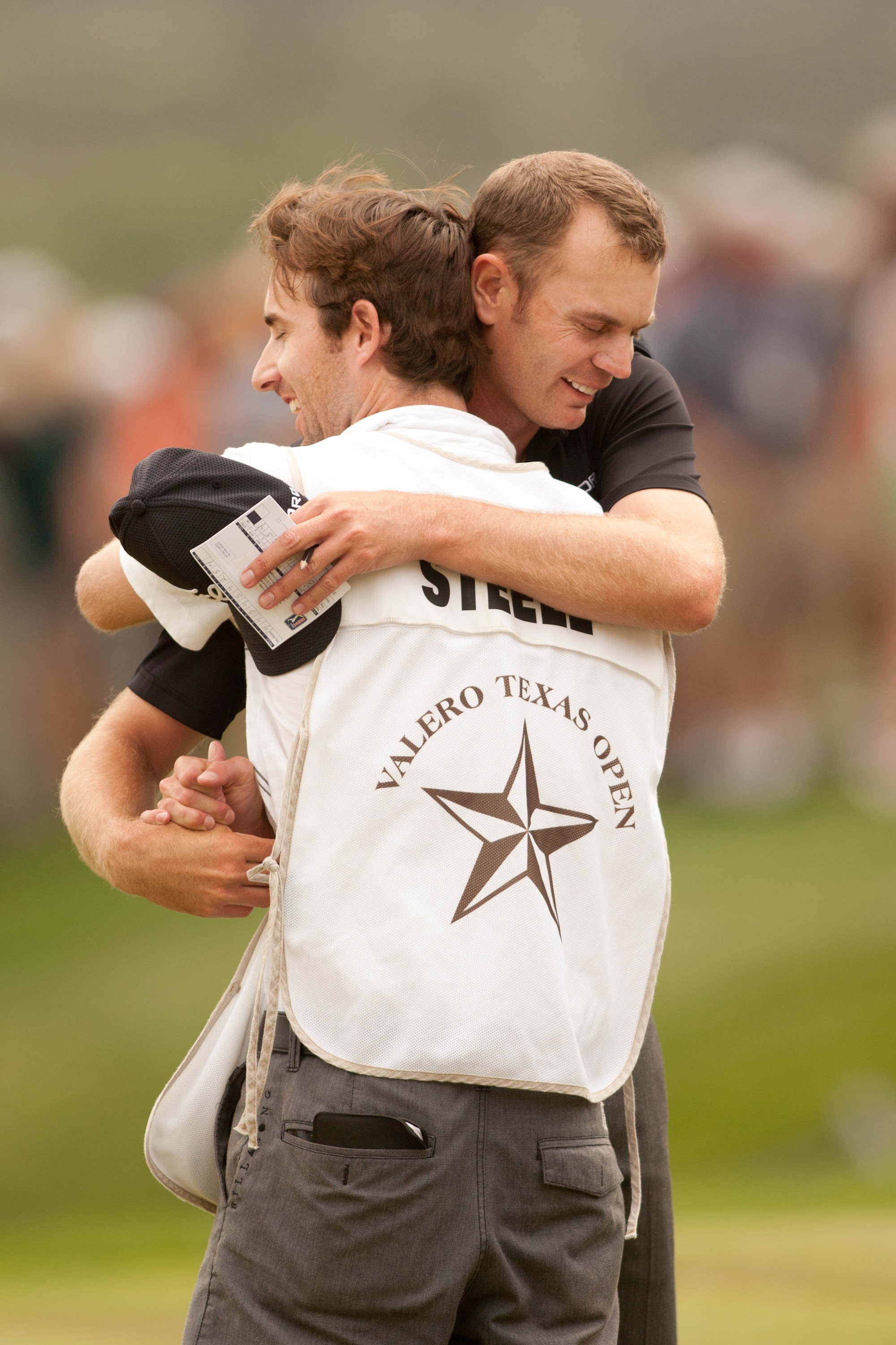 SAN ANTONIO, TX - APRIL 17: Brendan Steele celebrates with caddie Nick Wilkins during the final round of the Valero Texas Open at the AT&T Oaks Course at TPC San Antonio on April 17, 2011 in San Antonio, Texas. (Photo by Darren Carroll/Getty Images)