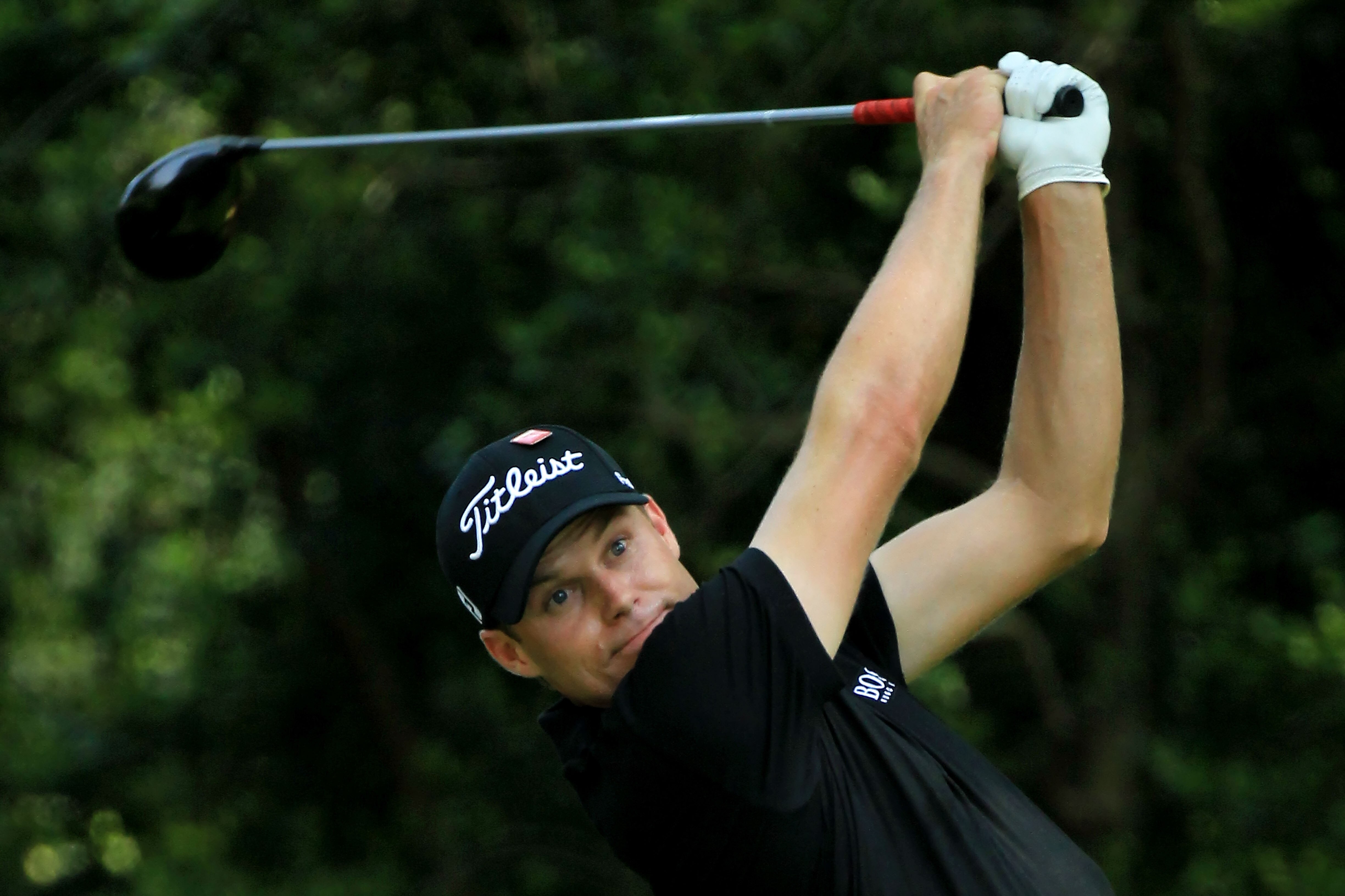 AUGUSTA, GA - APRIL 09:  Nick Watney watches his tee shot on the second hole during the third round of the 2011 Masters Tournament at Augusta National Golf Club on April 9, 2011 in Augusta, Georgia.  (Photo by David Cannon/Getty Images)