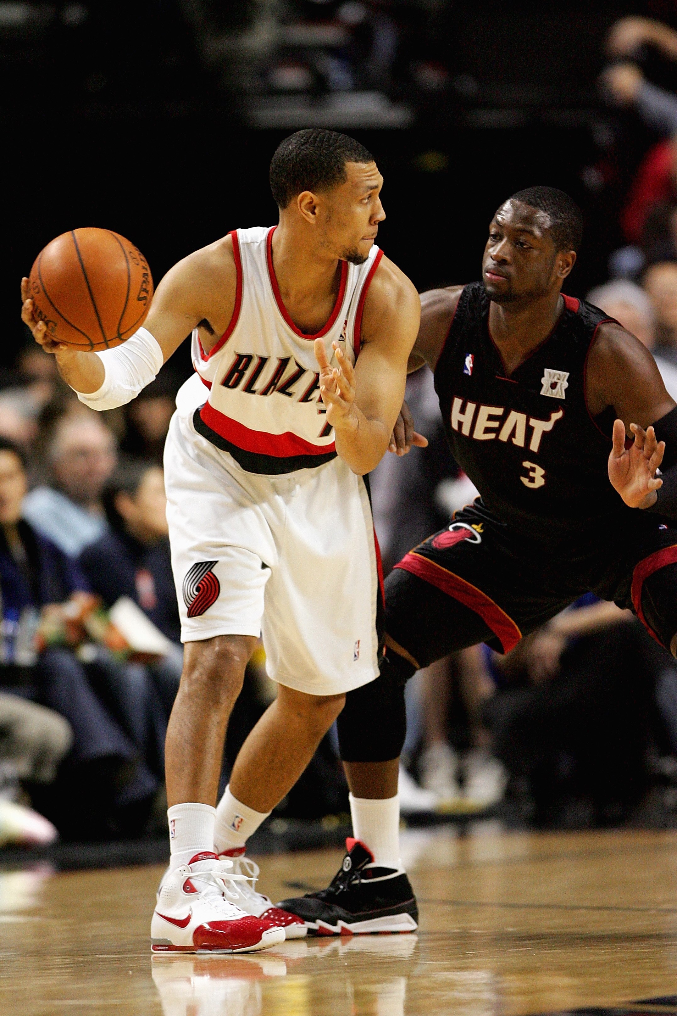 PORTLAND, OR - DECEMBER 6:  Brandon Roy #7 of the Portland Trail Blazers looks for an open pass around Dwyane Wade #3 of the Miami Heat during the game on December 6, 2007 at the Rose Garden in Portland, Oregon.  The Blazers won 112-106.  NOTE TO USER: Us