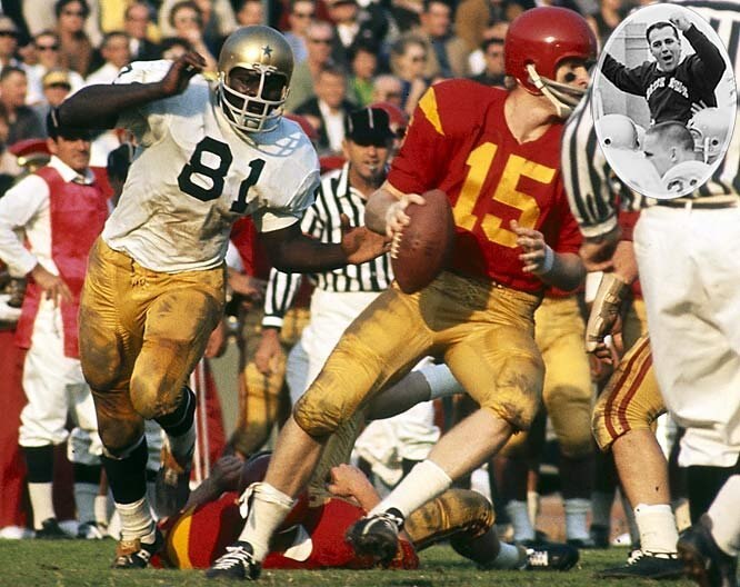 Notre Dame's Alan Page putting pressure on the USC QB