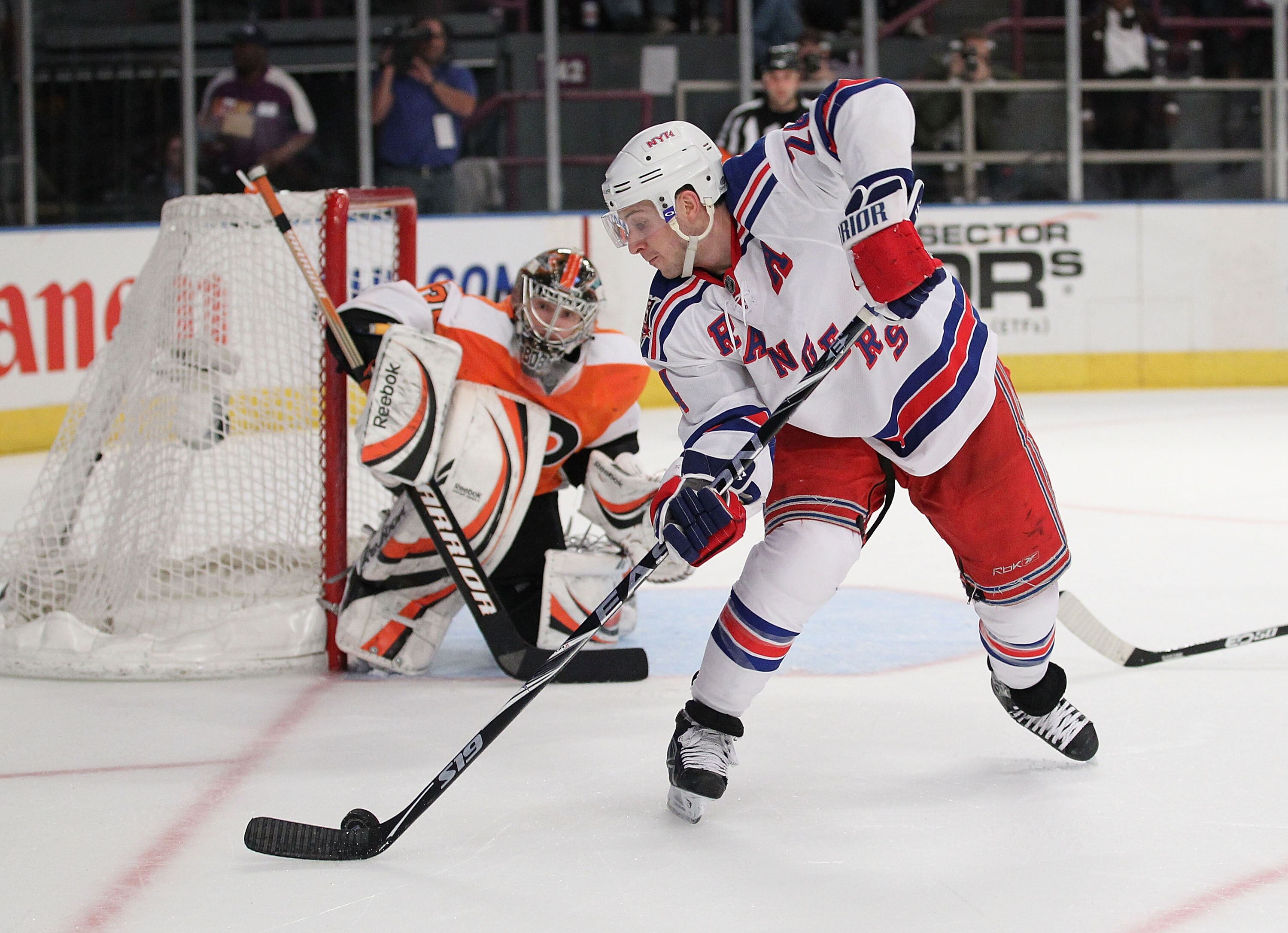 NEW YORK - MARCH 06:  Ryan Callahan #24 of the New York Rangers shoots the puck against Sergei Bobrovsky #35 of the Philadelphia Flyers during their game on March 6, 2011 at Madison Square Garden in New York City, New York.  (Photo by Al Bello/Getty Image