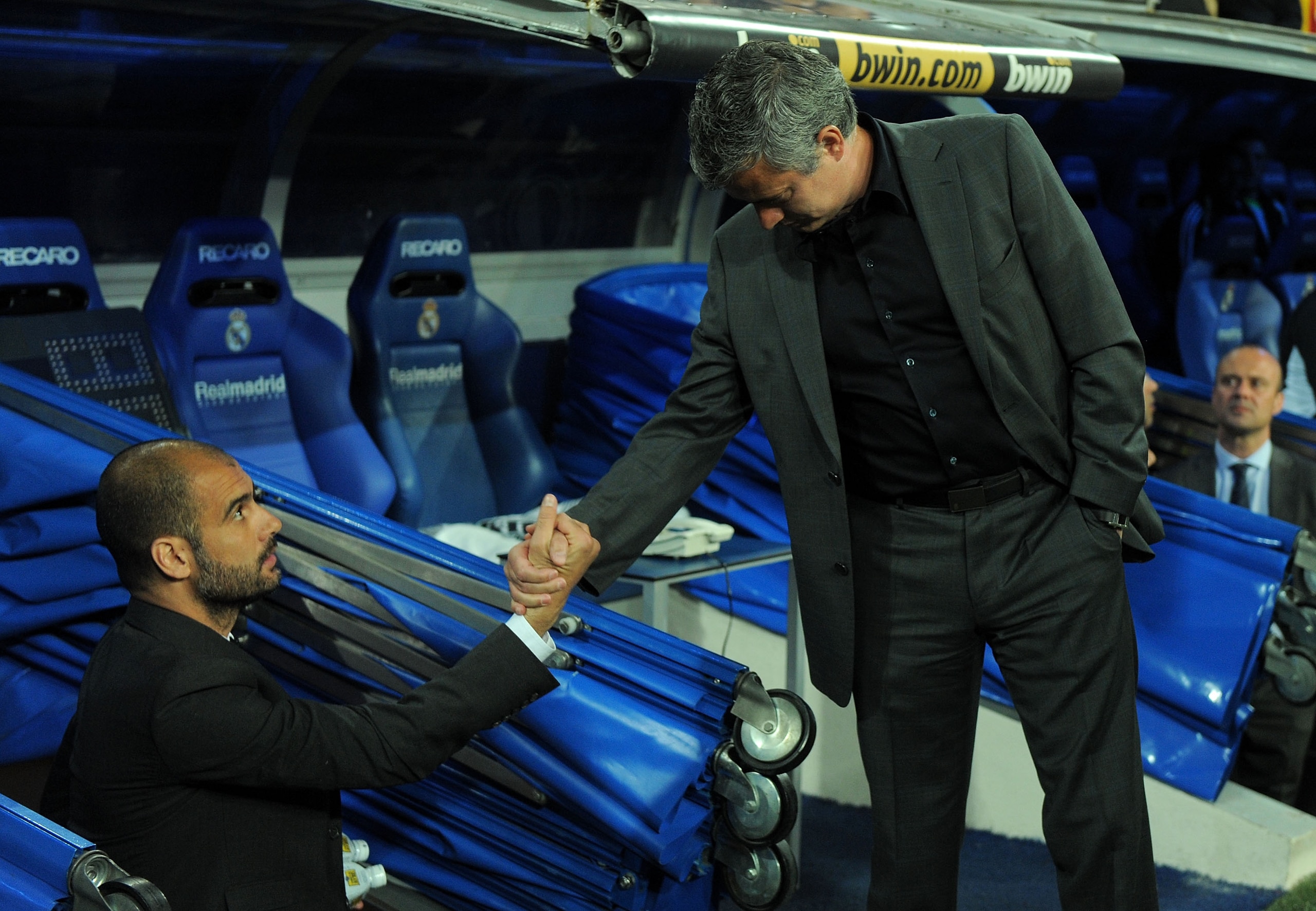 MADRID, SPAIN - APRIL 16: Barcelona manager (L) Josep Guardiola shakes hands with head coach Jose Mourinho of Real Madrid before the start of the La Liga match between Real Madrid and Barcelona at Estadio Santiago Bernabeu on April 16, 2011 in Madrid, Spa