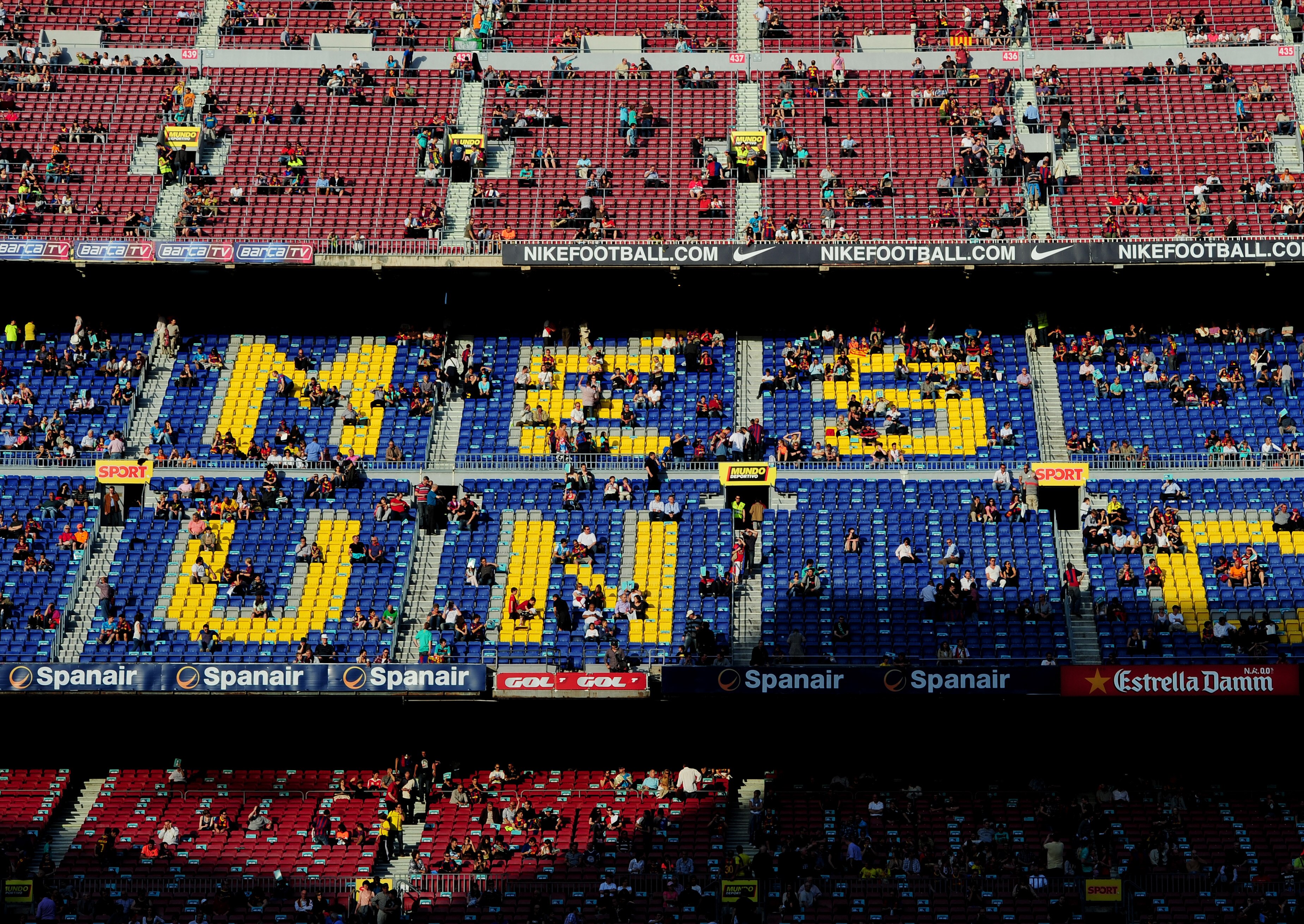 BARCELONA, SPAIN - APRIL 09:  FC Barcelona fans find their seats lit in late afternoon sunlight prior to the start of the la Liga match between FC Barcelona and UD Almeria at the Camp Nou stadium on April 9, 2011 in Barcelona, Spain.  (Photo by Jasper Jui