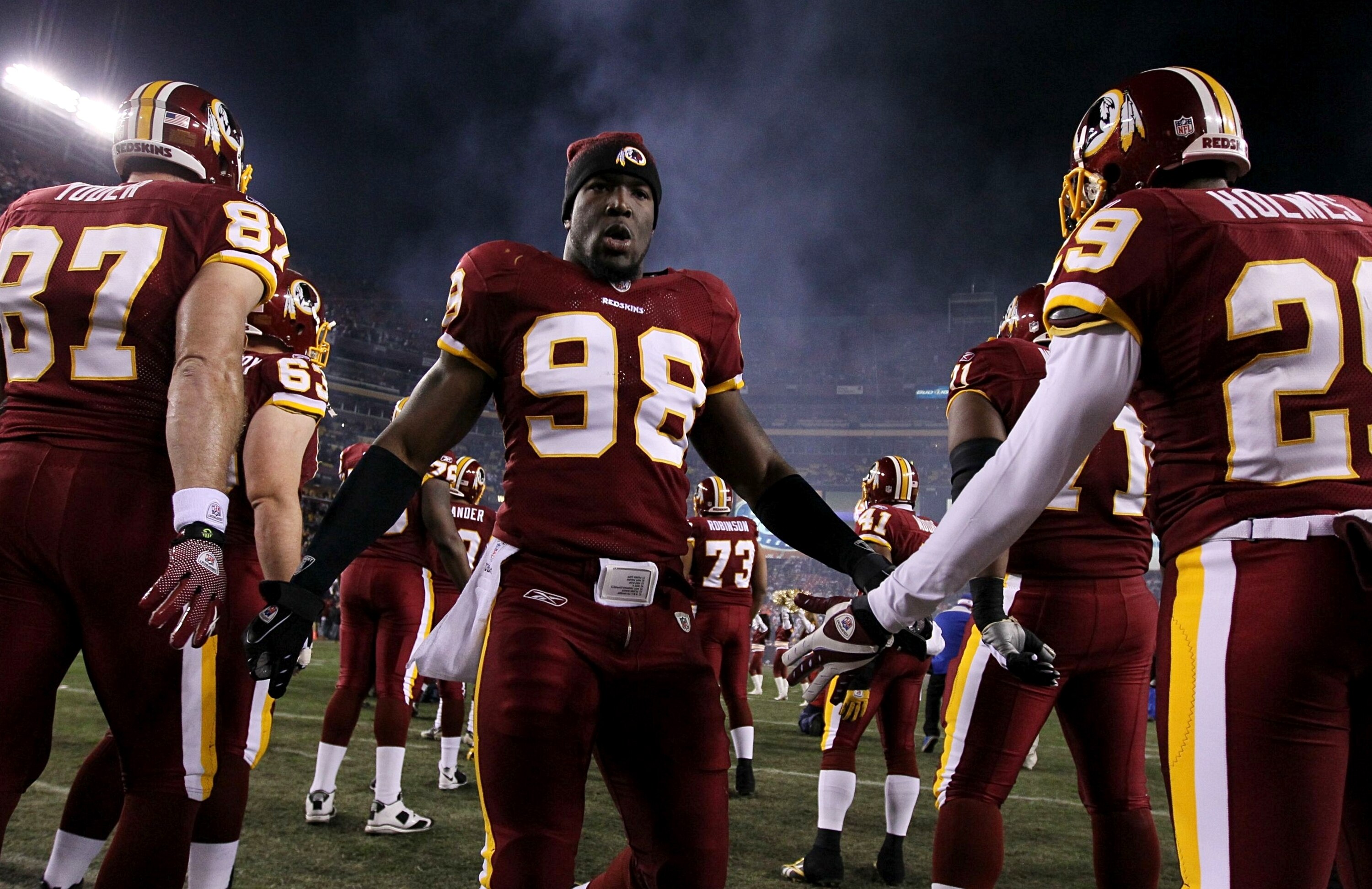 LANDOVER, MD - DECEMBER 21:  Brian Orakpo #98 of the Washington Redskins is introduced before the Redskins take on the Giants at FedEx Field on December 21, 2009 in Landover, Maryland. (Photo by Al Bello/Getty Images)