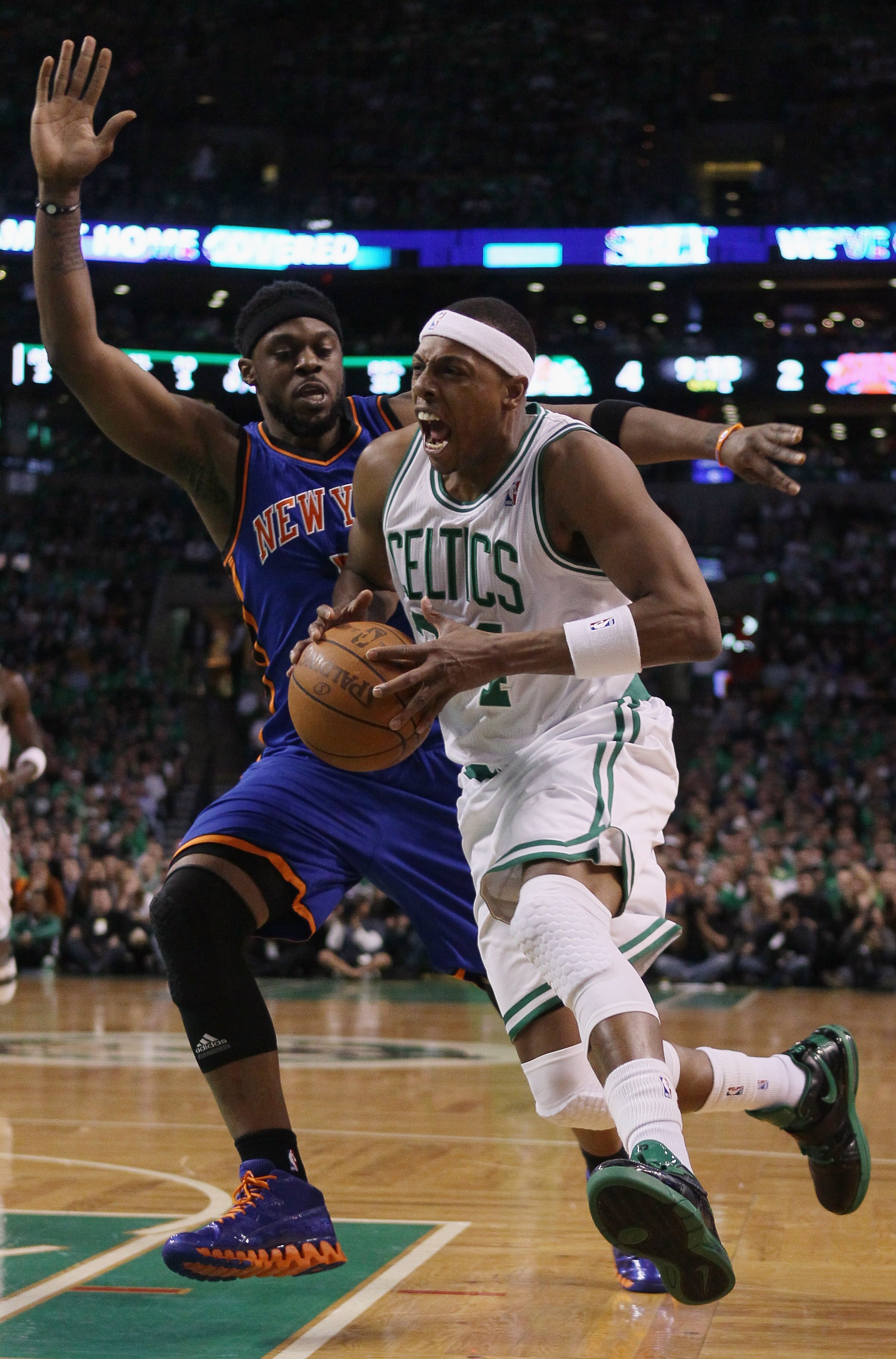 BOSTON, MA - APRIL 17:  Paul Pierce #34 of the Boston Celtics heads for the net as Bill Walker #5 of the New York Knicks defends in Game One of the Eastern Conference Quarterfinals in the 2011 NBA Playoffs on April 17, 2011 at the TD Garden in Boston, Mas