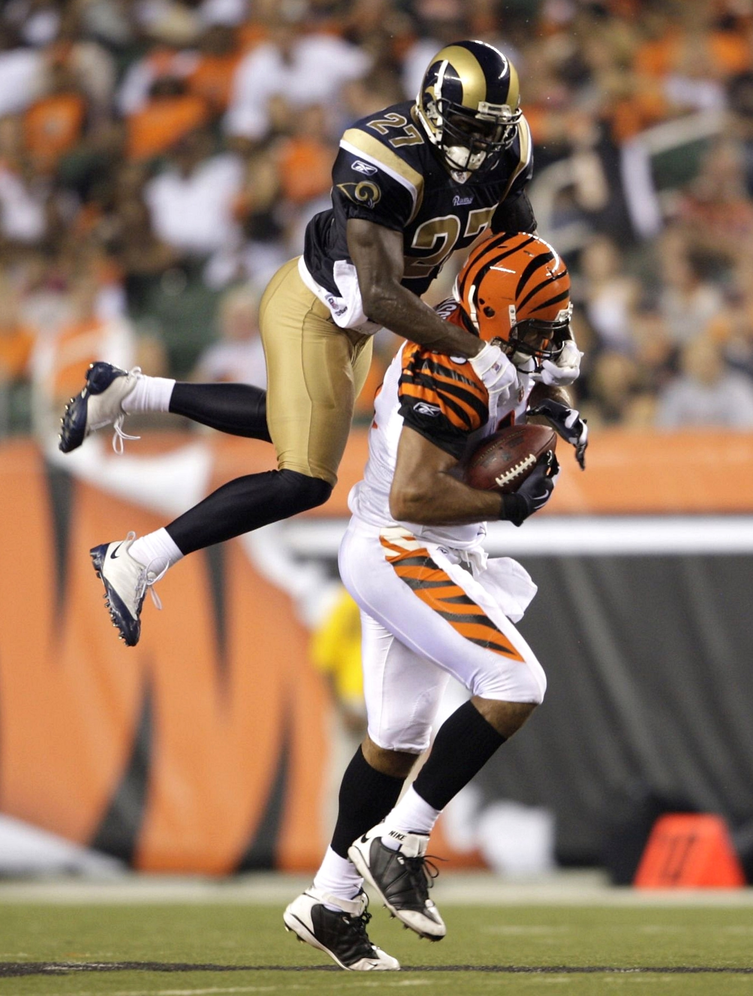 CINCINNATI, OH - AUGUST 27: Tight end J. P. Foschi #45 of the Cincinnati Bengals runs after the catch against David Roach #27 of the St. Louis Rams during the preseason game at Paul Brown Stadium on August 27, 2009 in Cincinnati, Ohio. (Photo by Andy Lyo CINCINNATI, OH - AUGUST 27: Tight end J. P. Foschi #45 of the Cincinnati Bengals runs after the catch against David Roach #27 of the St. Louis Rams during the preseason game at Paul Brown Stadium on August 27, 2009 in Cincinnati, Ohio. (Photo by Andy Lyo