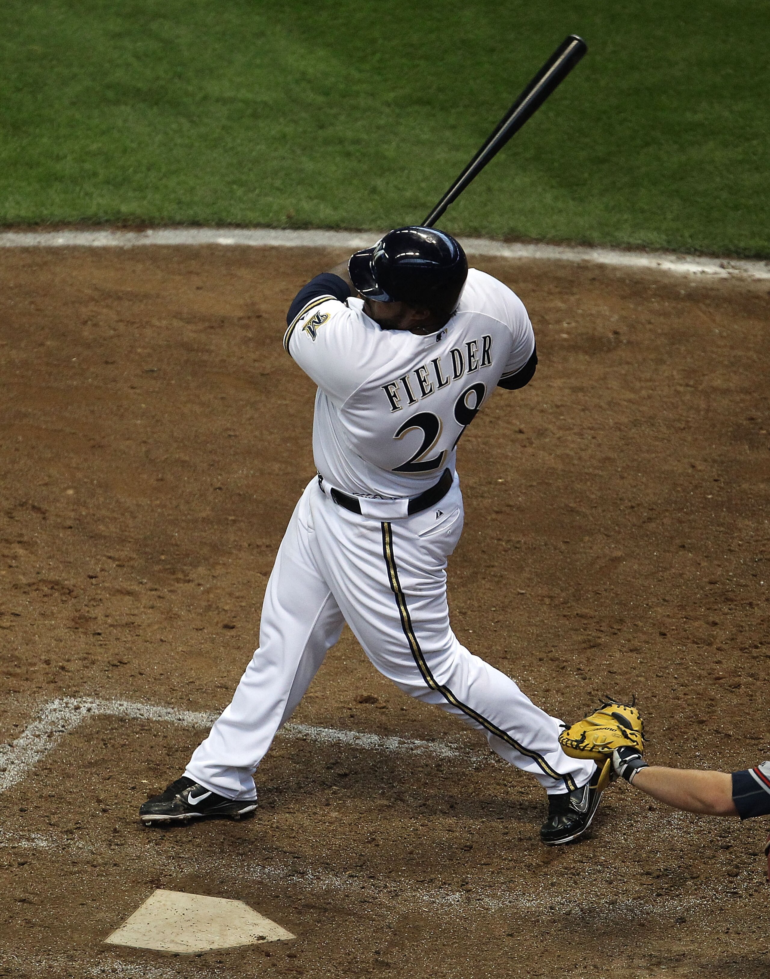 MILWAUKEE, WI - APRIL 04: Prince Fielder #28 of the Milwaukee Brewers hits the ball against the Atlanta Braves during the home opener at Miller Park on April 4, 2011 in Milwaukee, Wisconsin. The Braves defeated the Brewers 2-1. (Photo by Jonathan Daniel/G MILWAUKEE, WI - APRIL 04: Prince Fielder #28 of the Milwaukee Brewers hits the ball against the Atlanta Braves during the home opener at Miller Park on April 4, 2011 in Milwaukee, Wisconsin. The Braves defeated the Brewers 2-1. (Photo by Jonathan Daniel/G