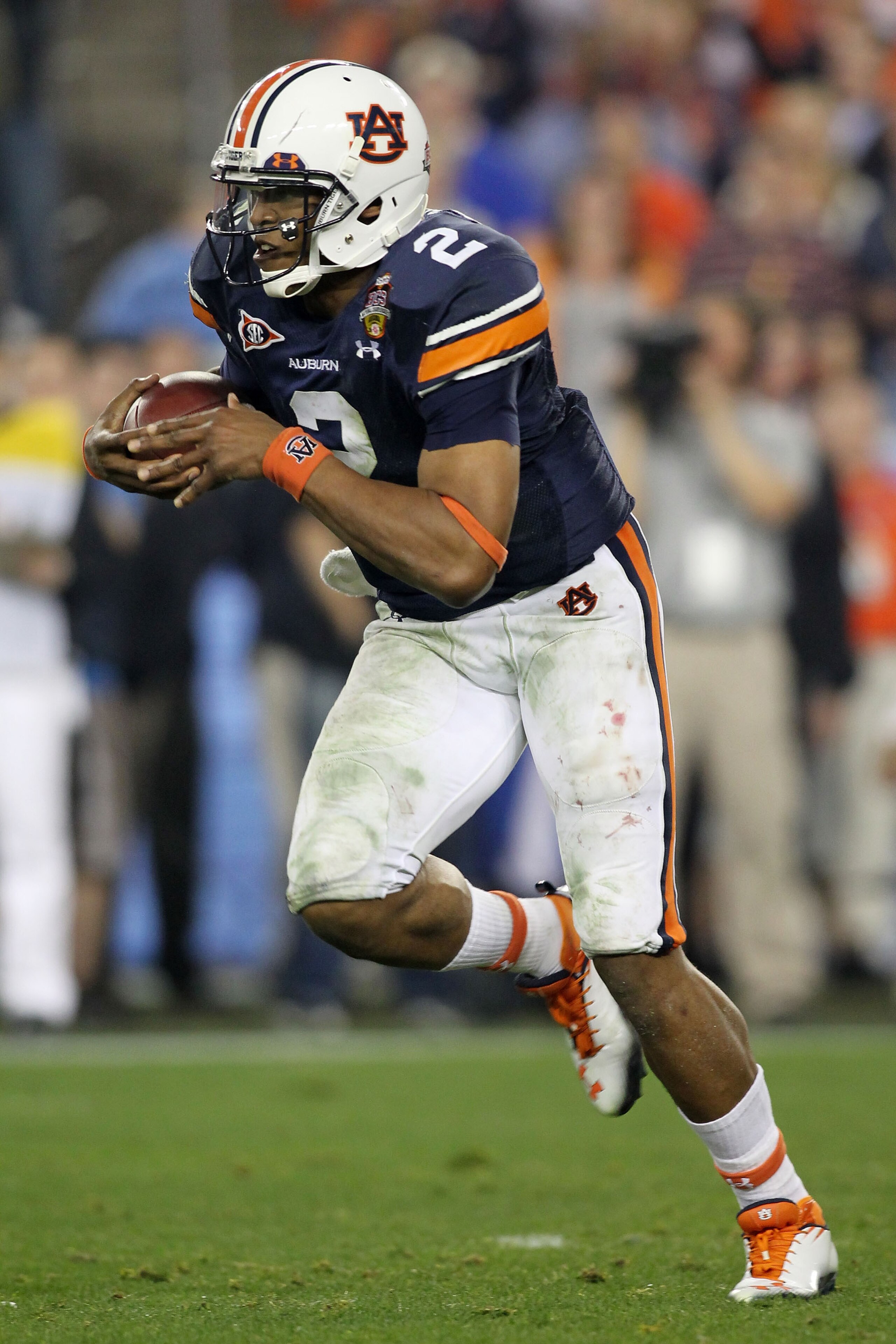 GLENDALE, AZ - JANUARY 10: Cameron Newton #2 of the Auburn Tigers runs down field against the Oregon Ducks during the Tostitos BCS National Championship Game at University of Phoenix Stadium on January 10, 2011 in Glendale, Arizona. (Photo by Jonathan F GLENDALE, AZ - JANUARY 10: Cameron Newton #2 of the Auburn Tigers runs down field against the Oregon Ducks during the Tostitos BCS National Championship Game at University of Phoenix Stadium on January 10, 2011 in Glendale, Arizona. (Photo by Jonathan F