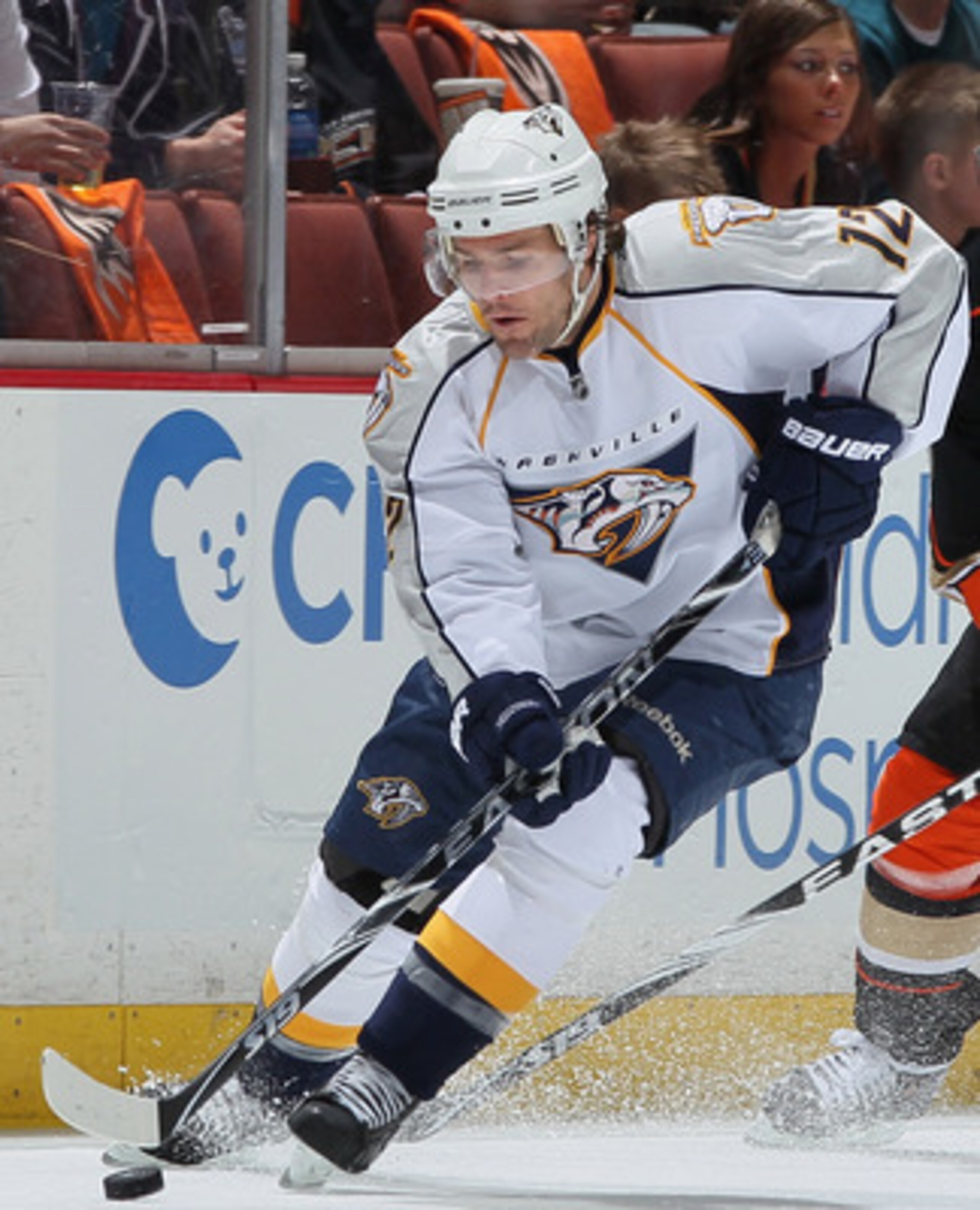 ANAHEIM, CA - APRIL 15:  Mike Fisher #12 of the Nashville Predators is pursued by Teemu Selanne # 8 of the Anaheim Ducks for the puck in the first period of Game Two of the Western Conference Quarterfinals during the 2011 NHL Stanley Cup Playoffs at Honda